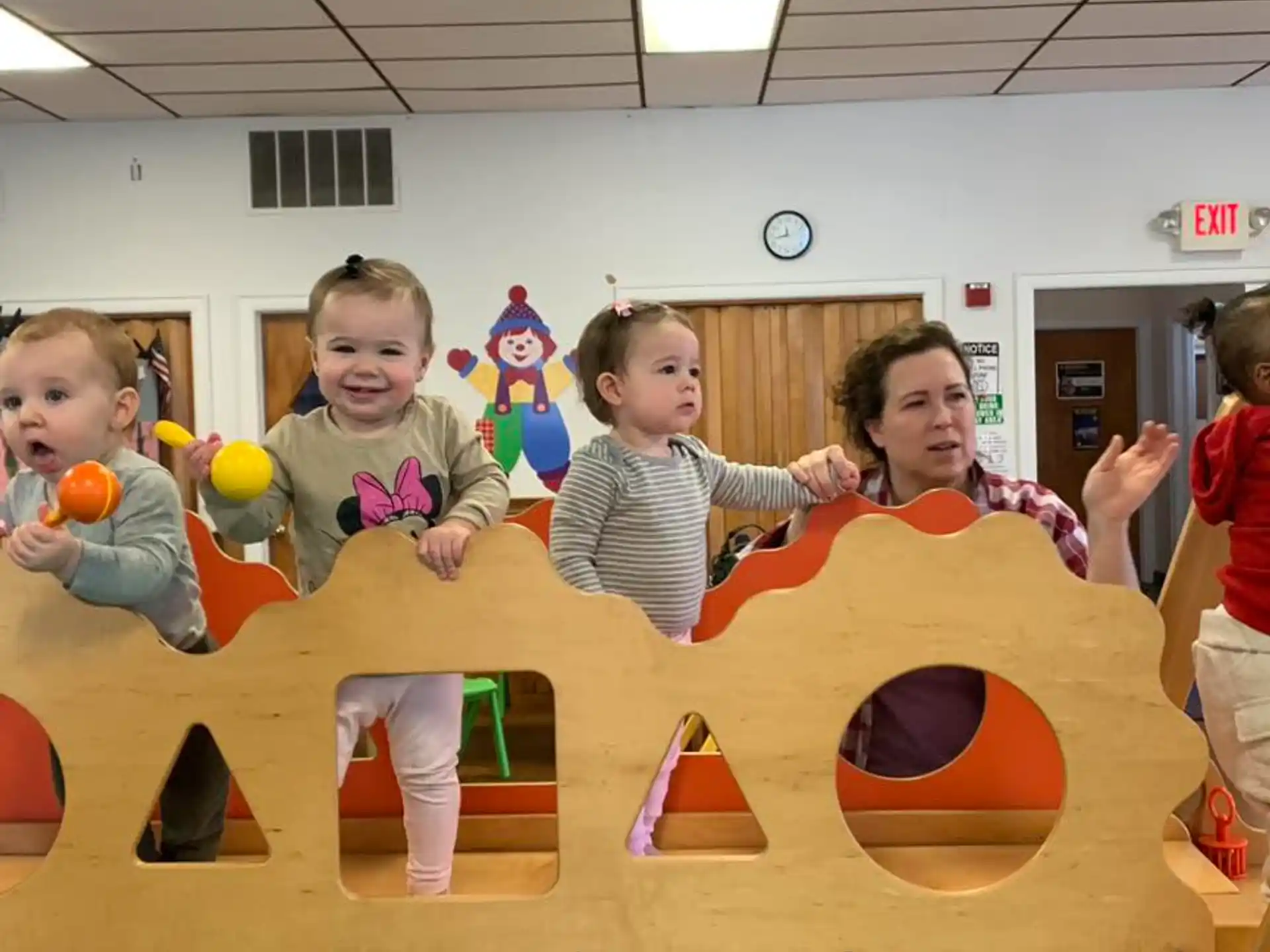 a group of kids playing on a table