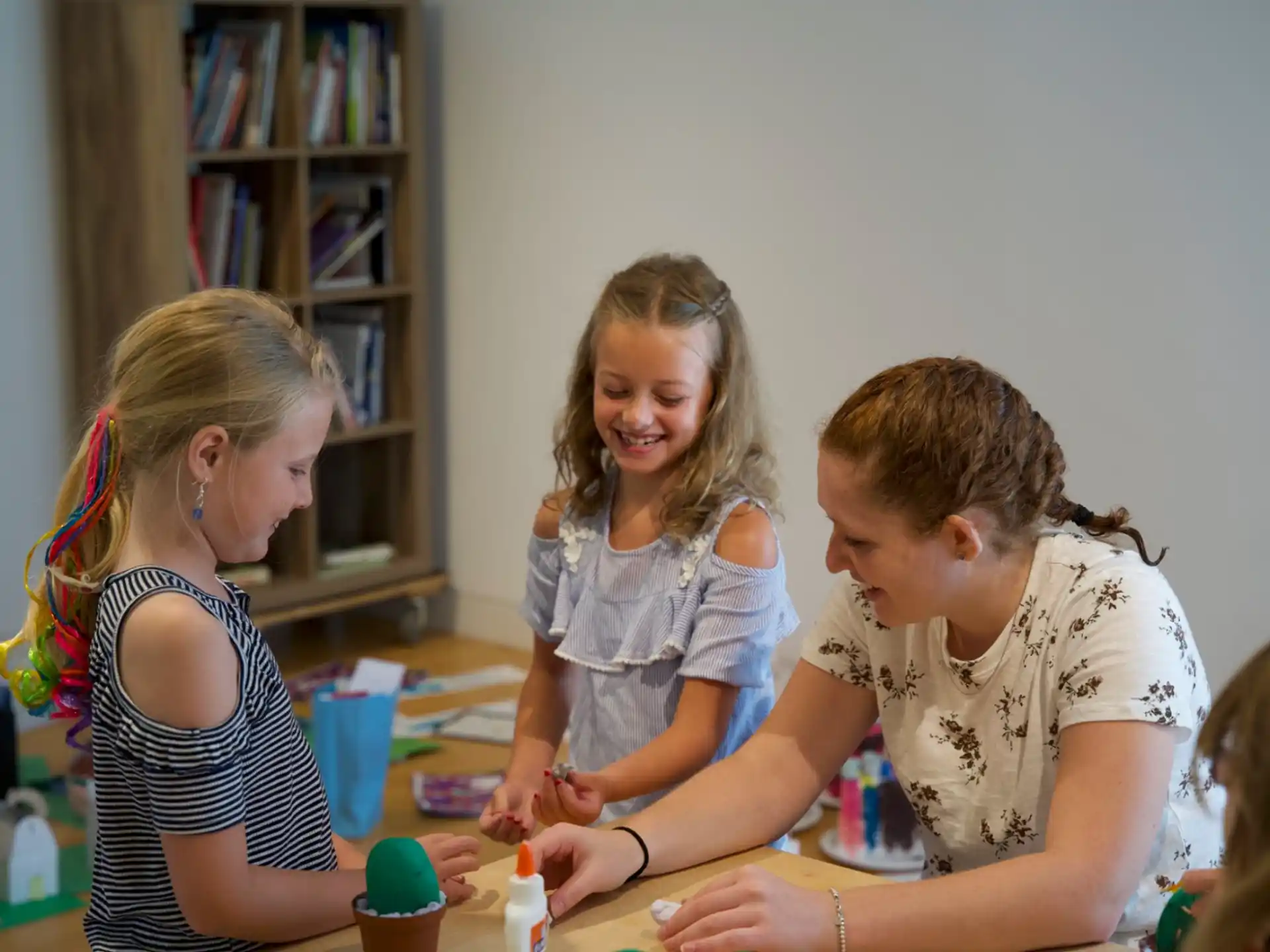 a group of children playing with toys