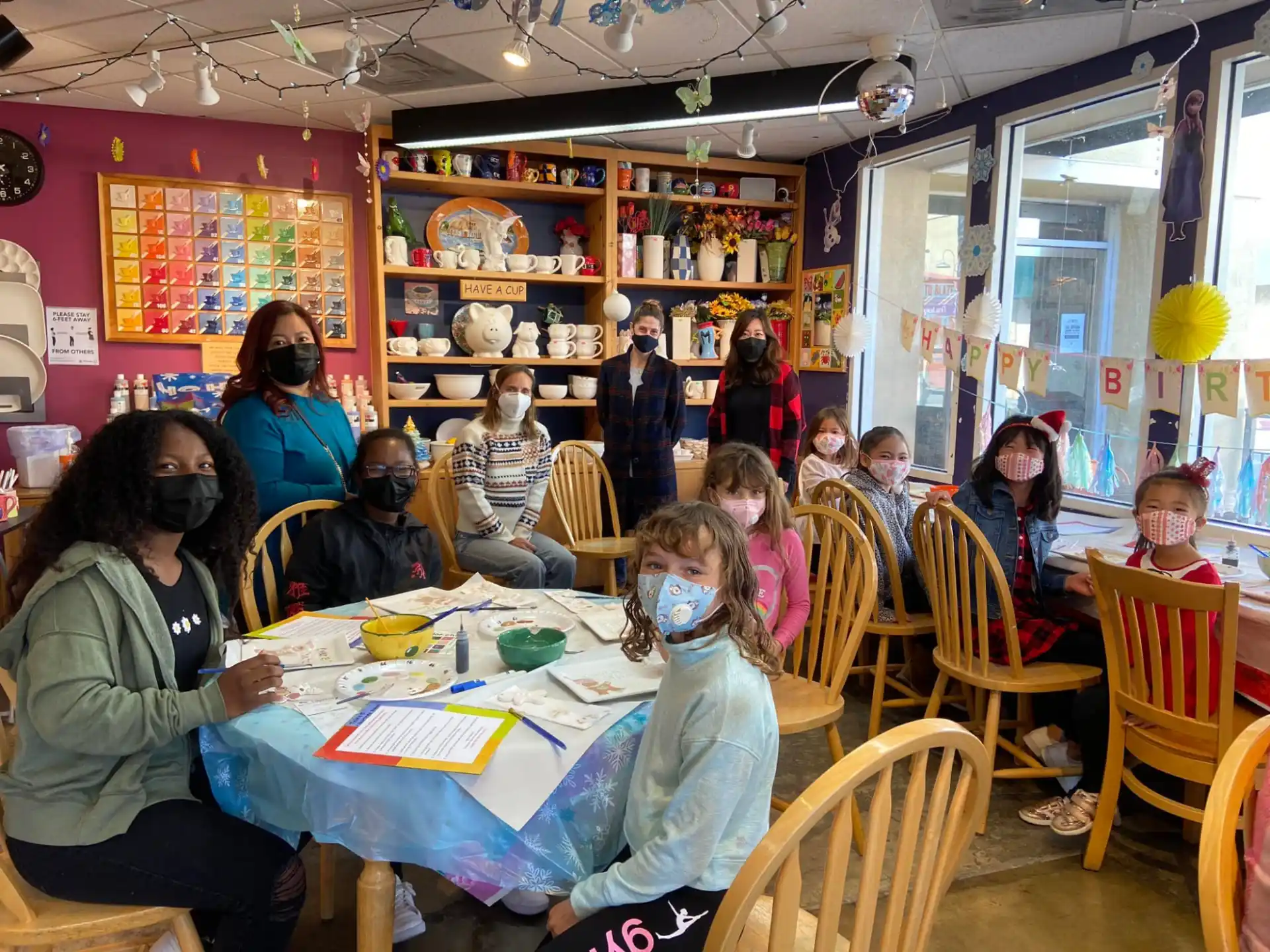 a group of people sitting at a table