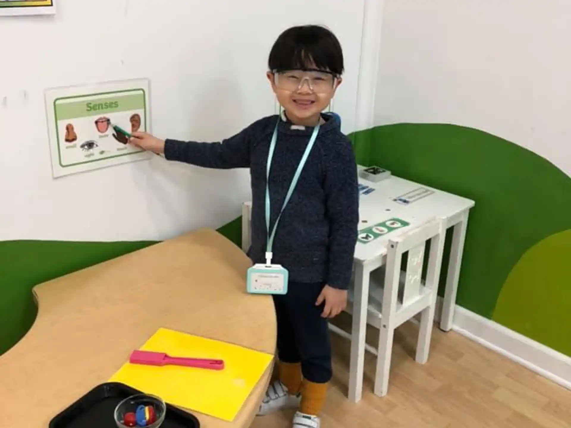 a boy standing in a room