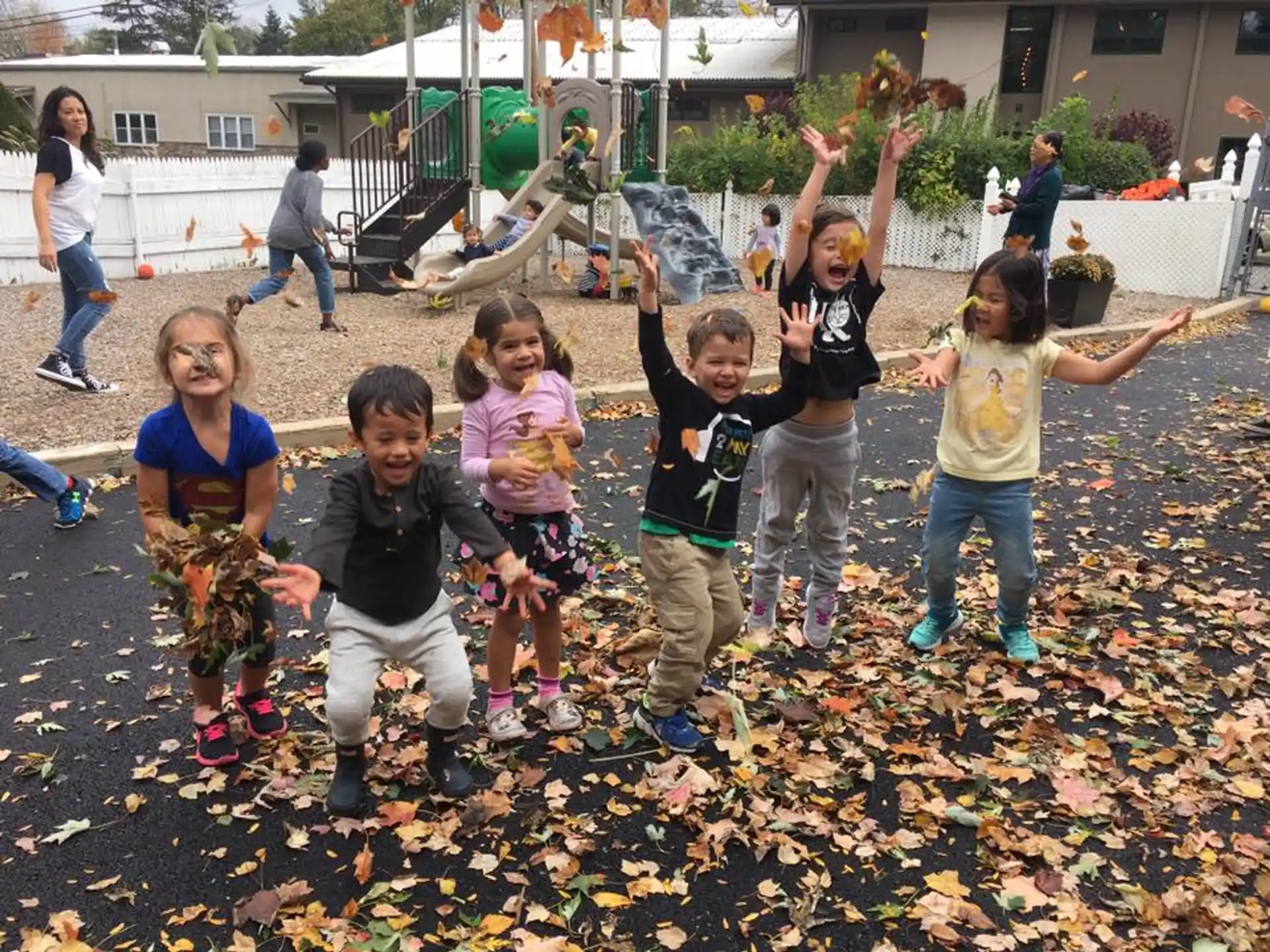 a group of children jumping in the air