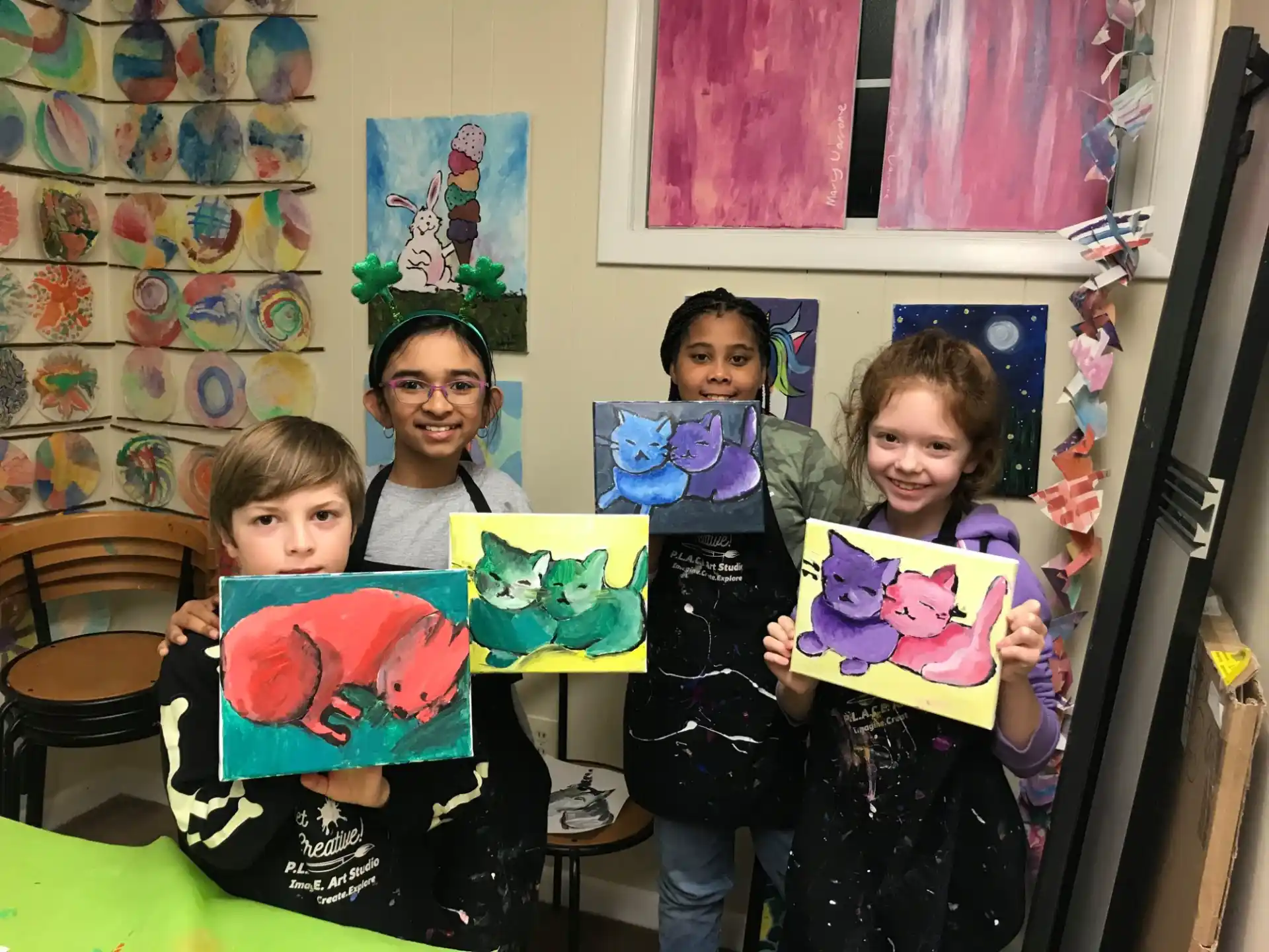 a group of children holding books