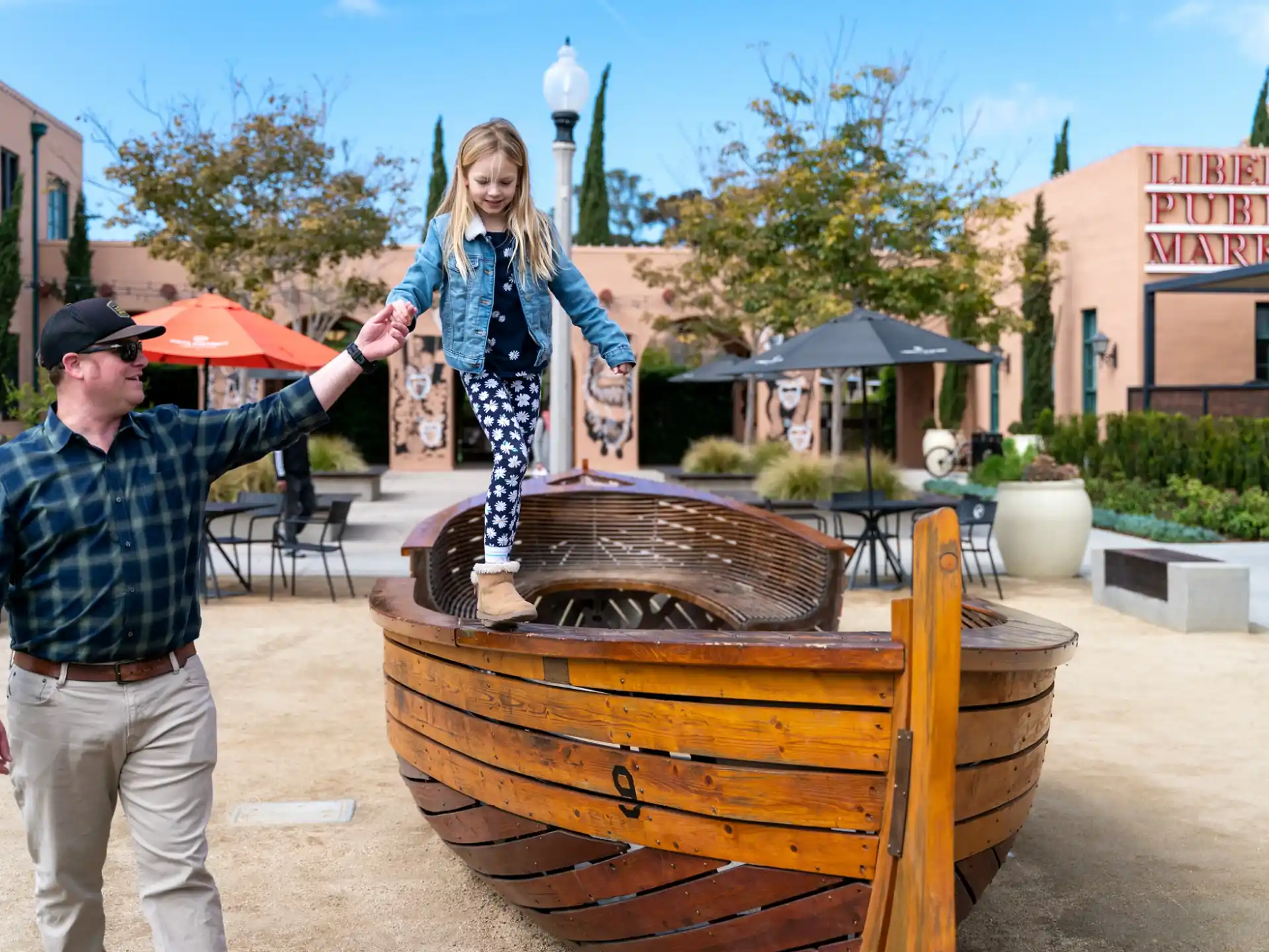 a person standing on a barrel