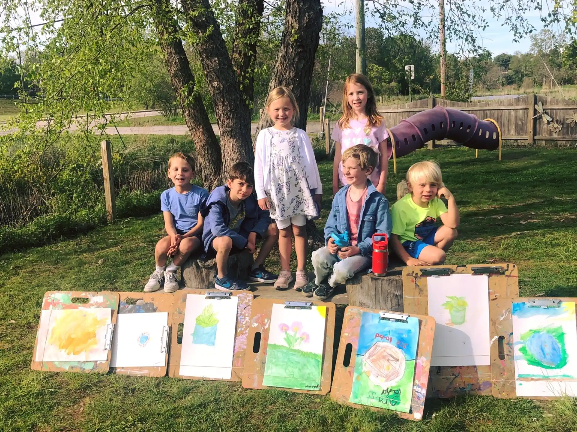 a group of children posing for a photo