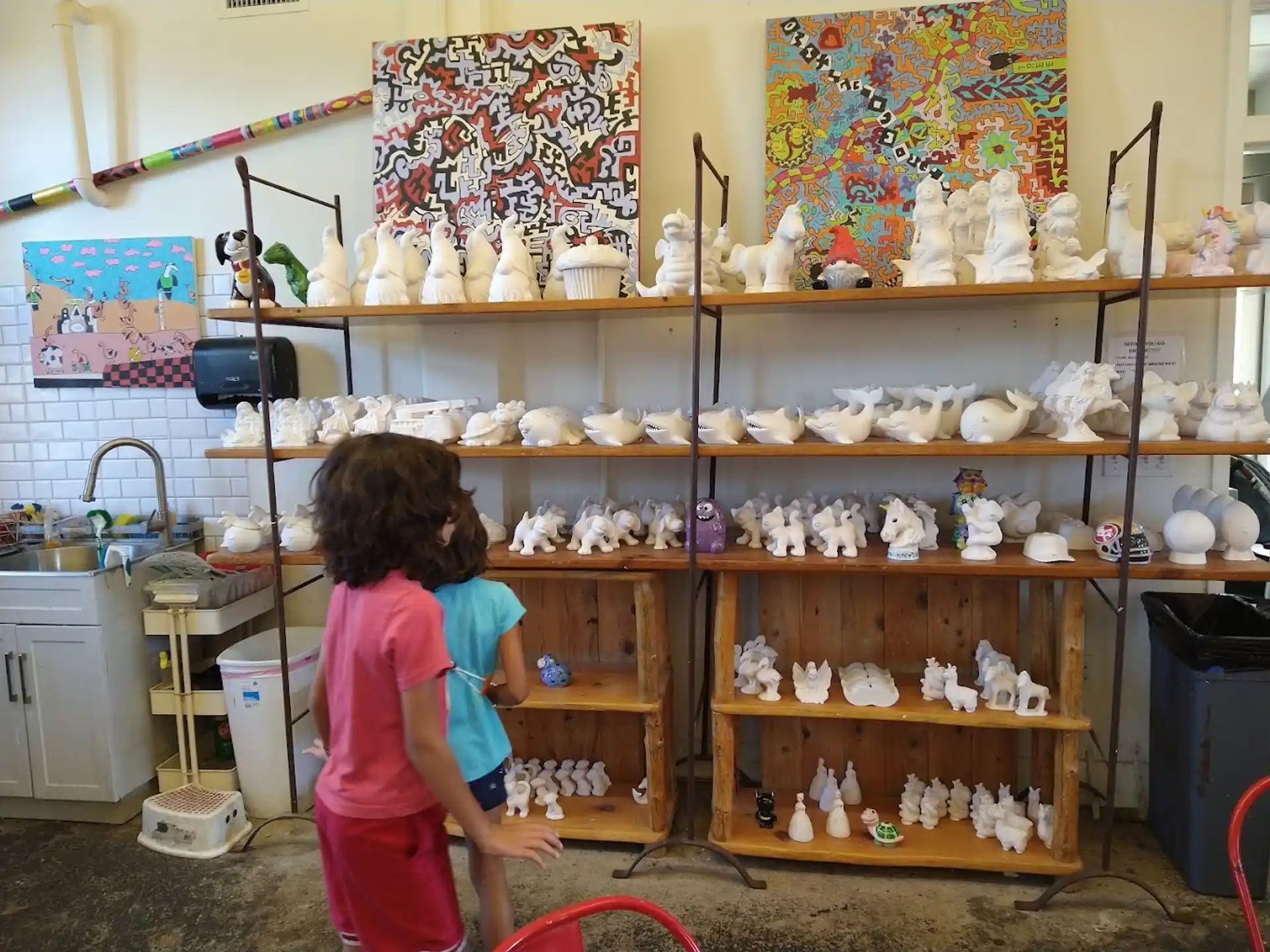 a couple of kids playing with toys