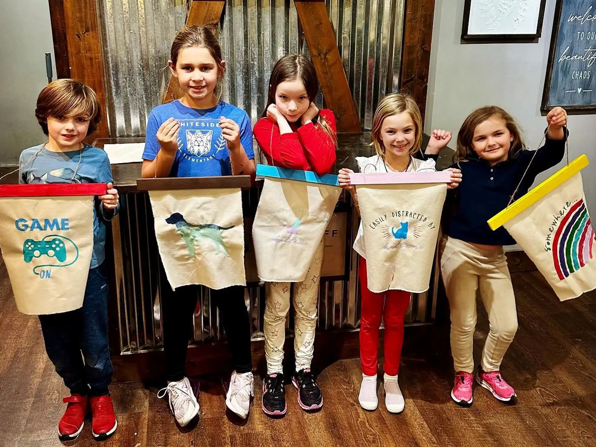 a group of children holding flags