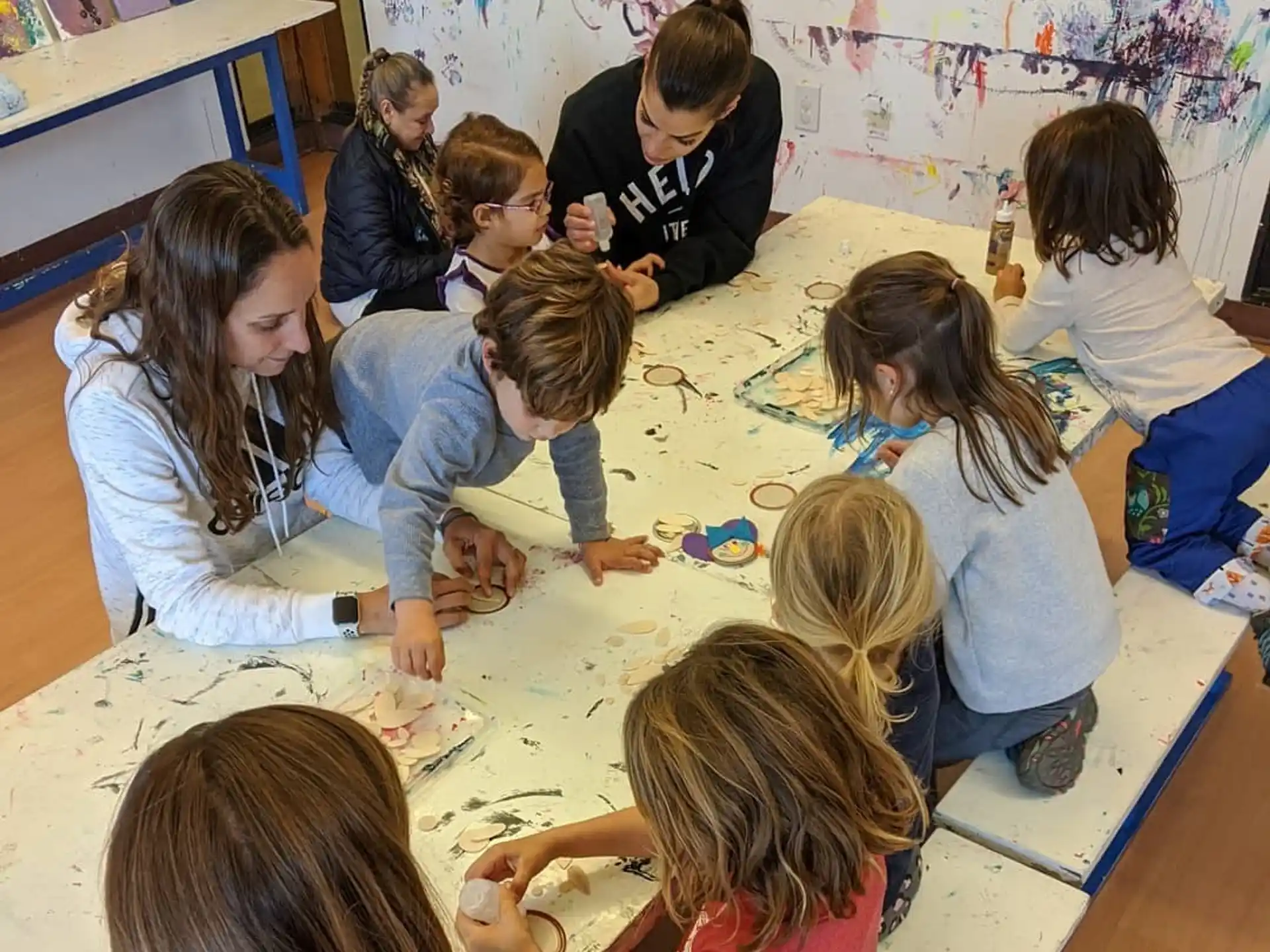 a group of children playing with toys