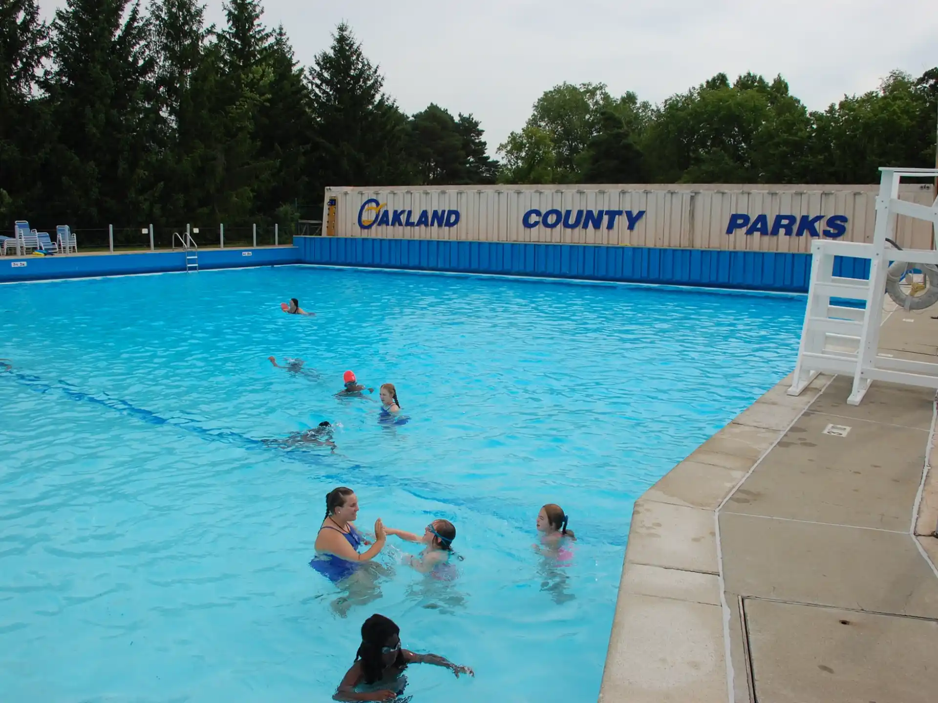 a group of people in a pool