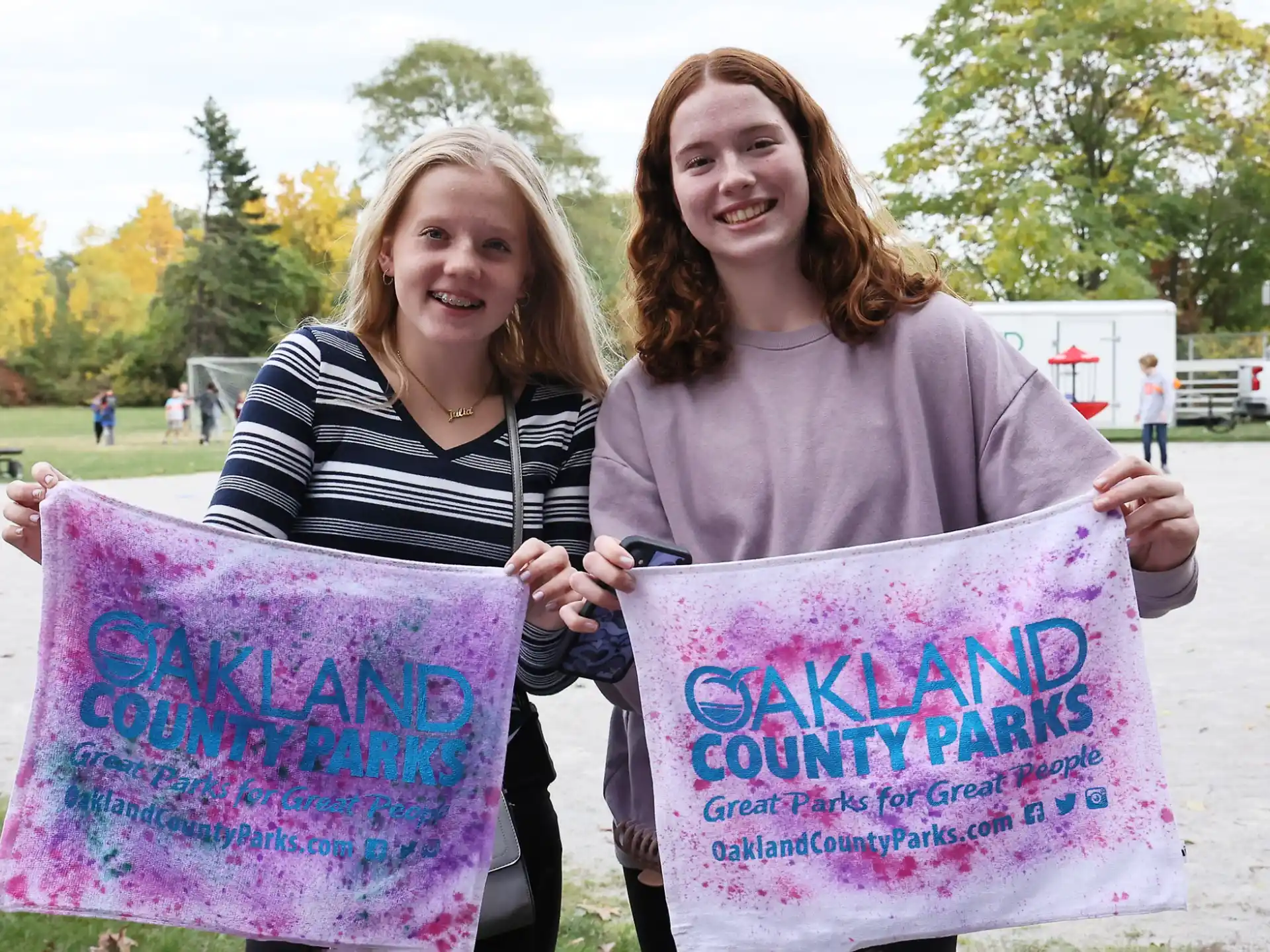 a group of women holding signs