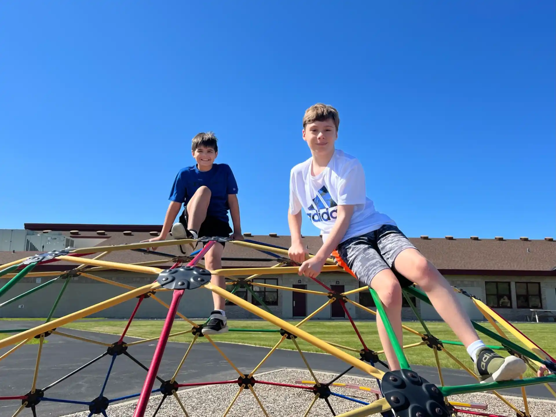 a couple of boys on a playground