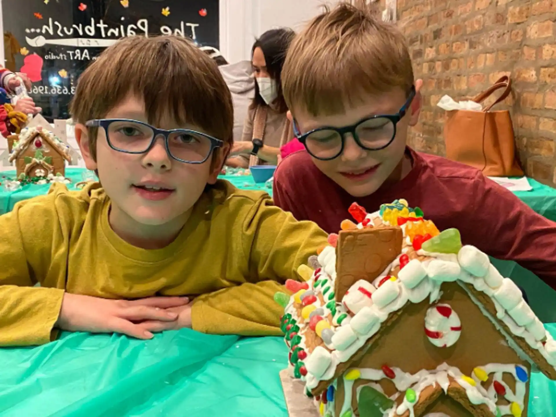 two boys sitting at a table