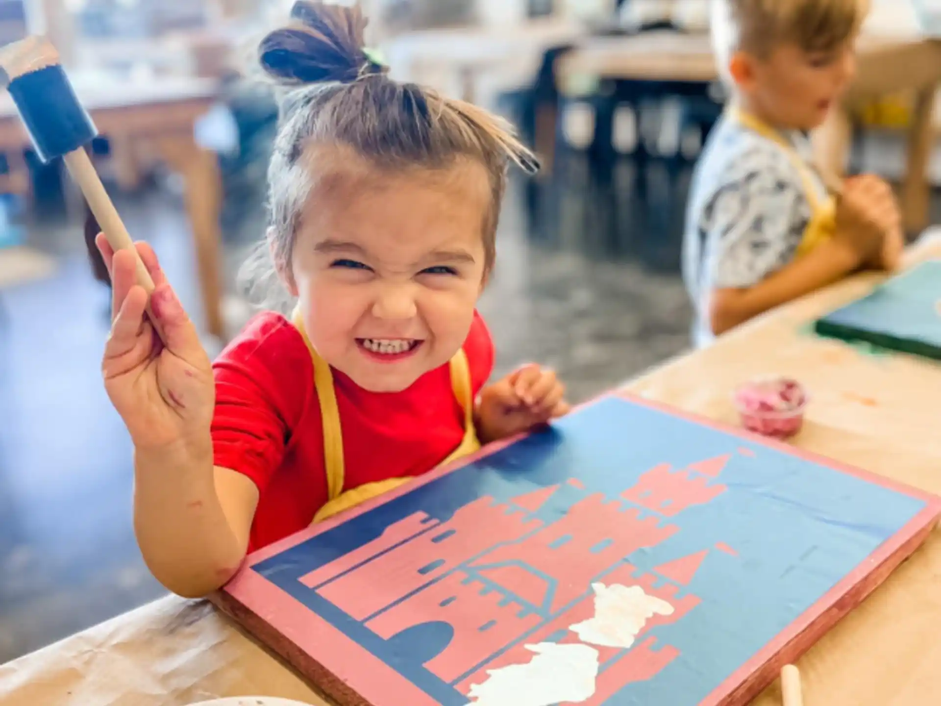 a young girl painting
