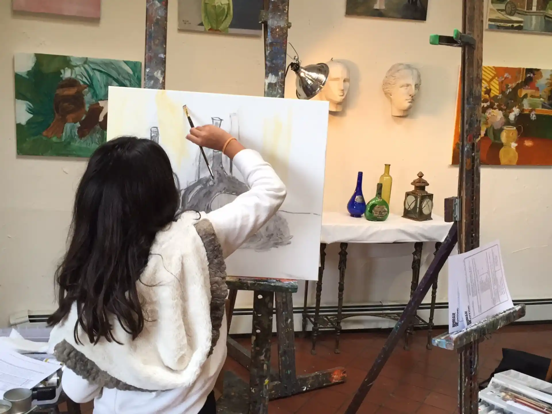 a person painting in a room