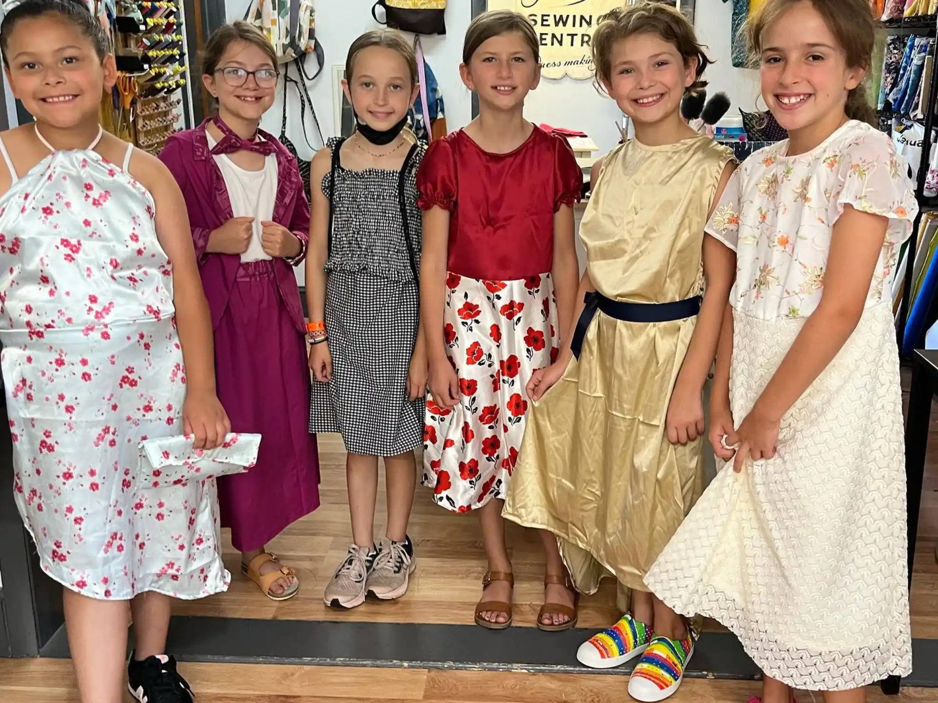 a group of girls posing for a photo