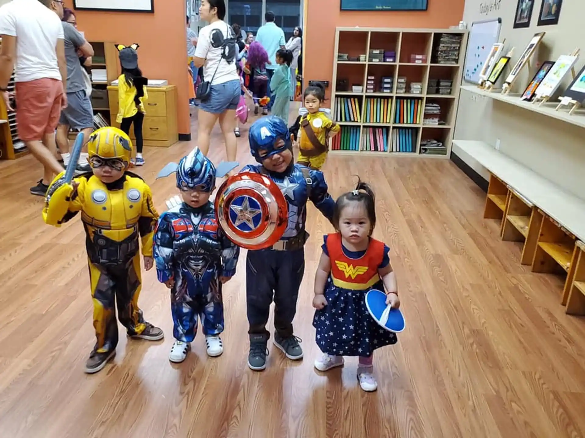 a group of kids wearing clothing