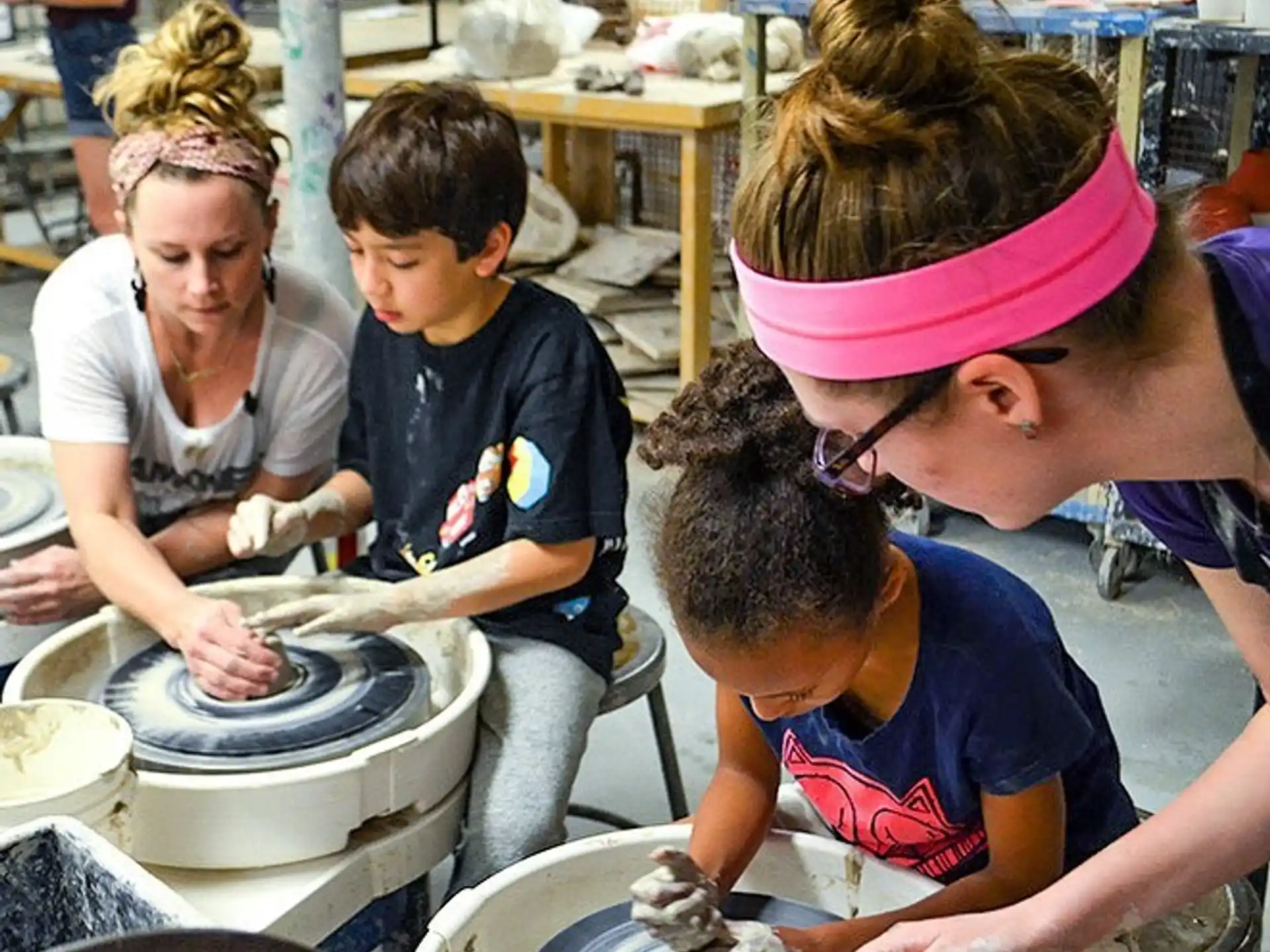 a group of kids working in a factory
