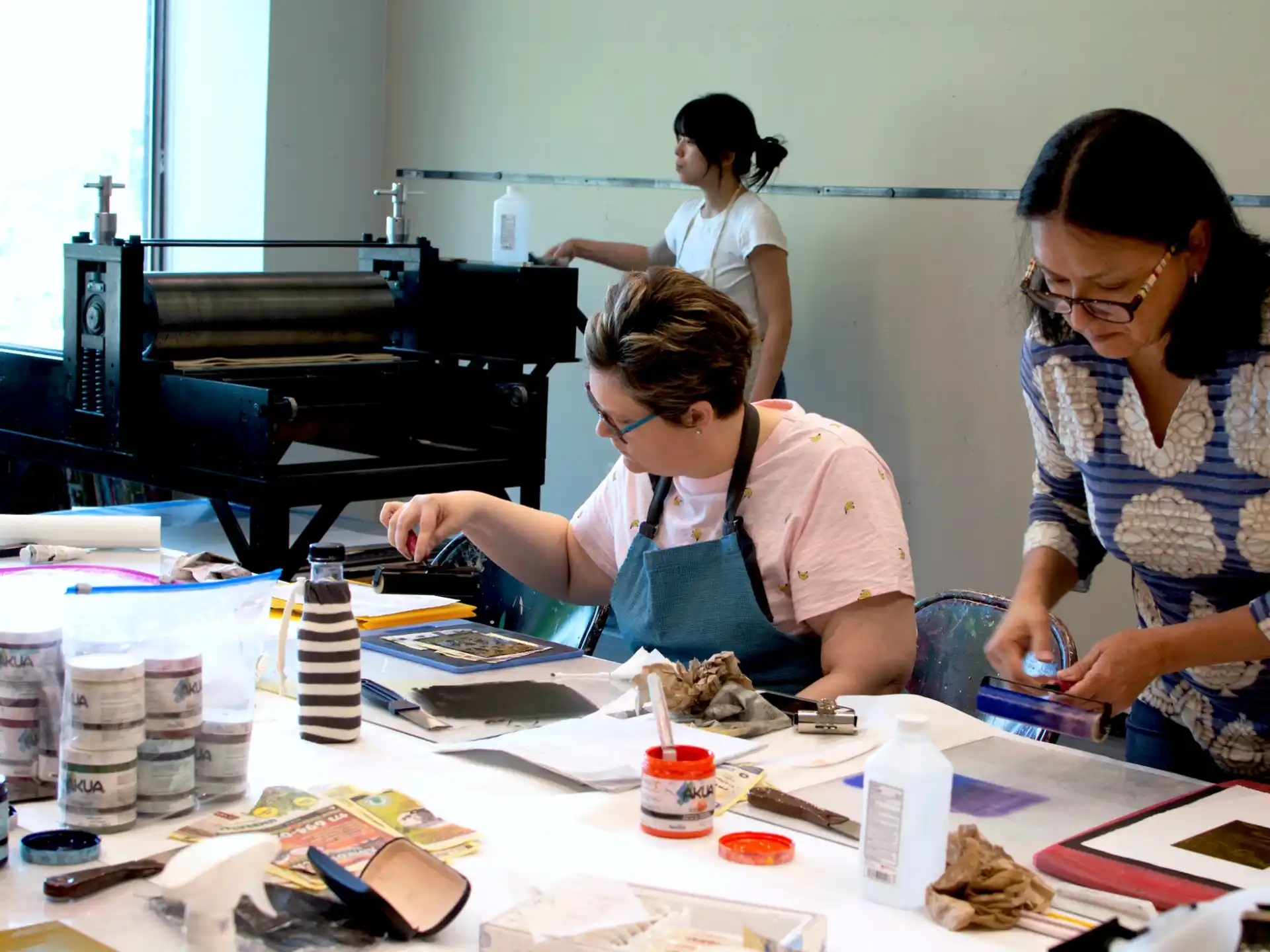 a group of women working on a project
