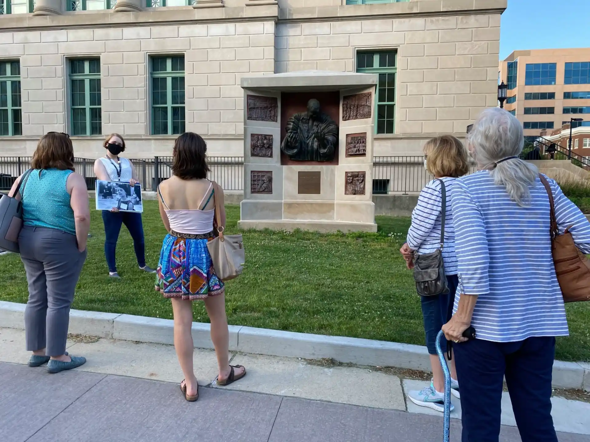 a group of people standing outside a building
