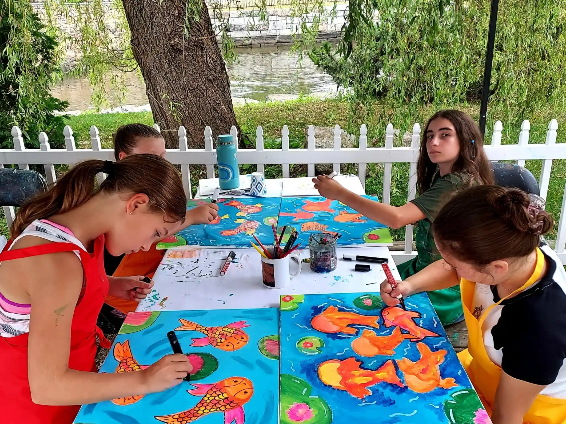 a group of people painting