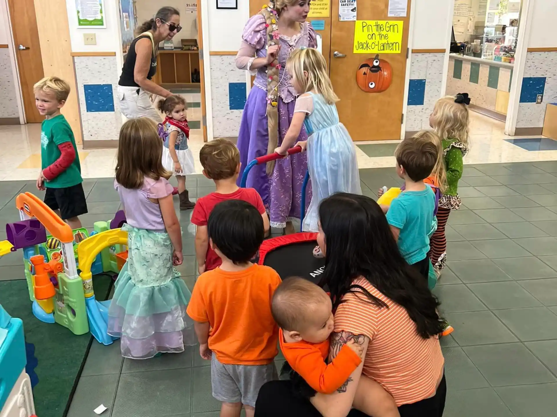 a group of children playing in a room