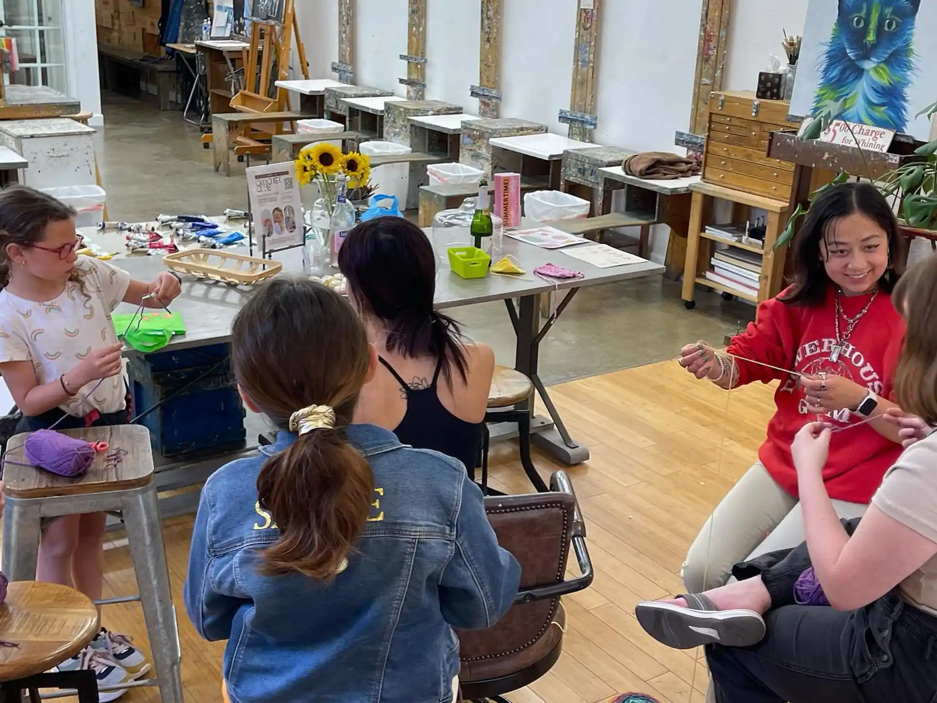 a group of people sitting around a table