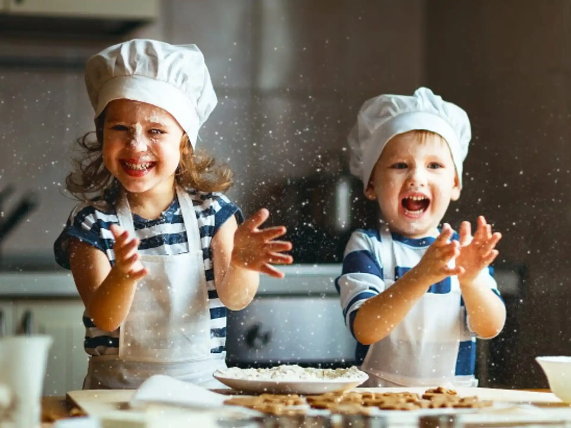 a couple of kids wearing white hats