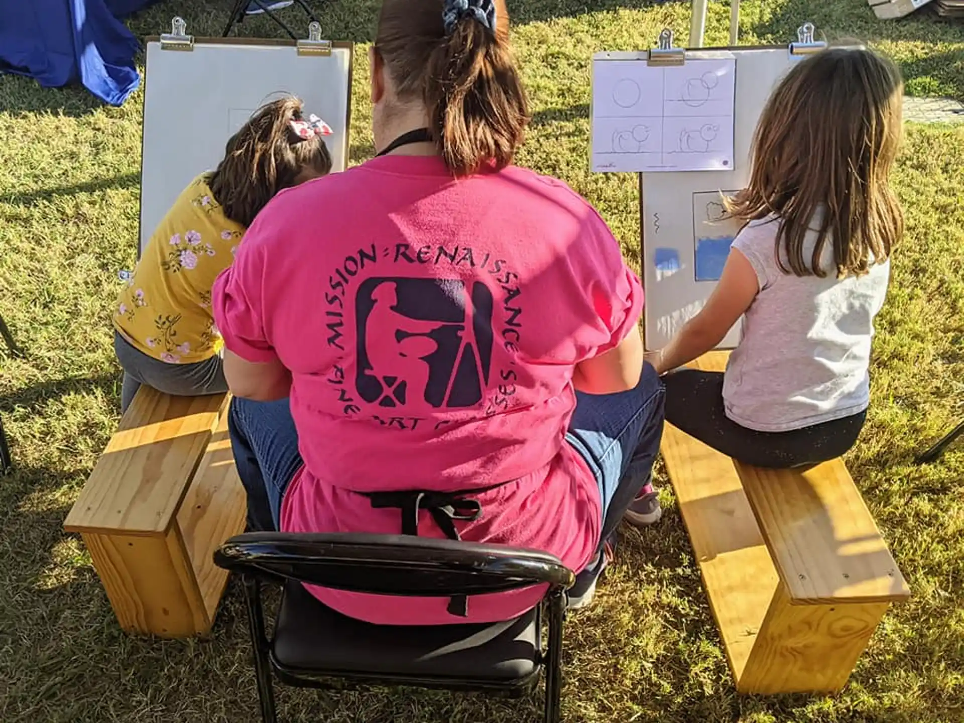 a group of girls painting