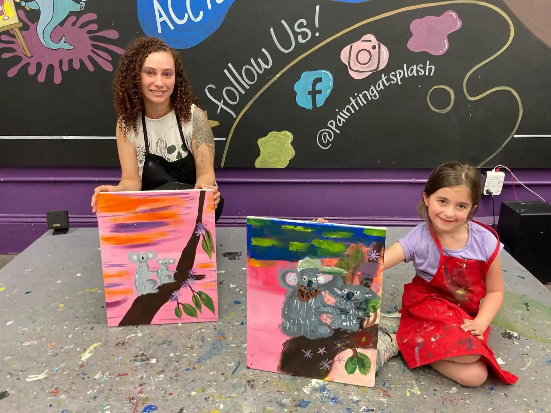 a person and a girl holding up posters