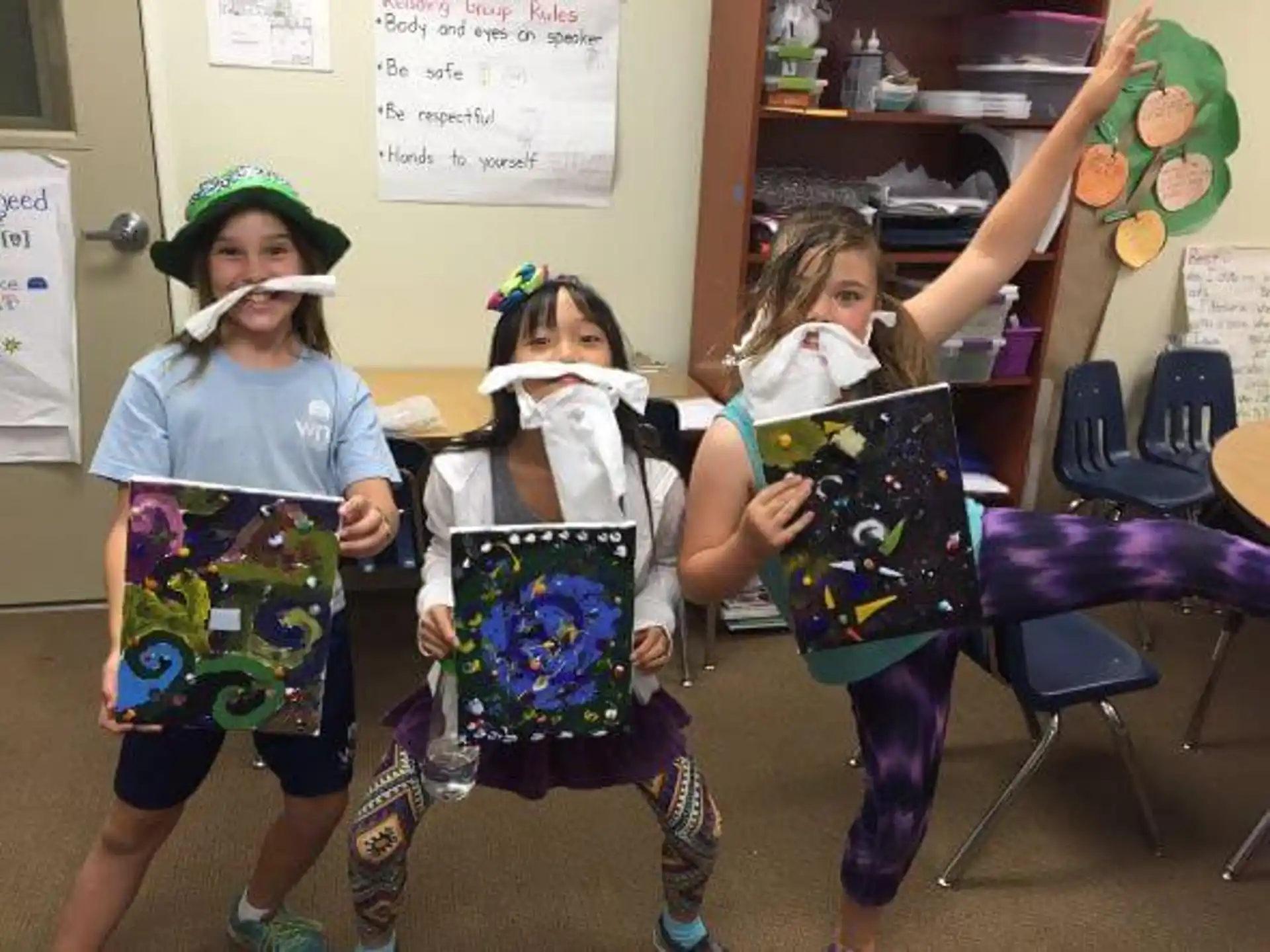 a group of girls wearing clothing