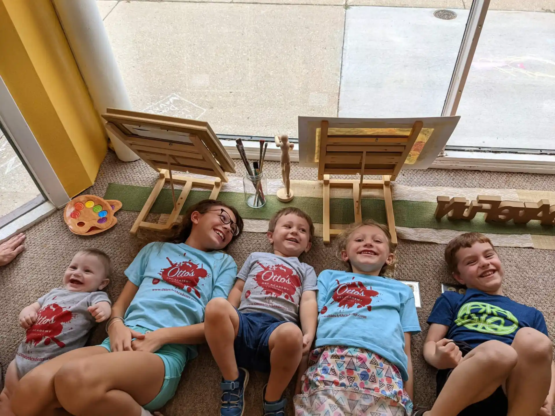 a group of kids sitting on a couch
