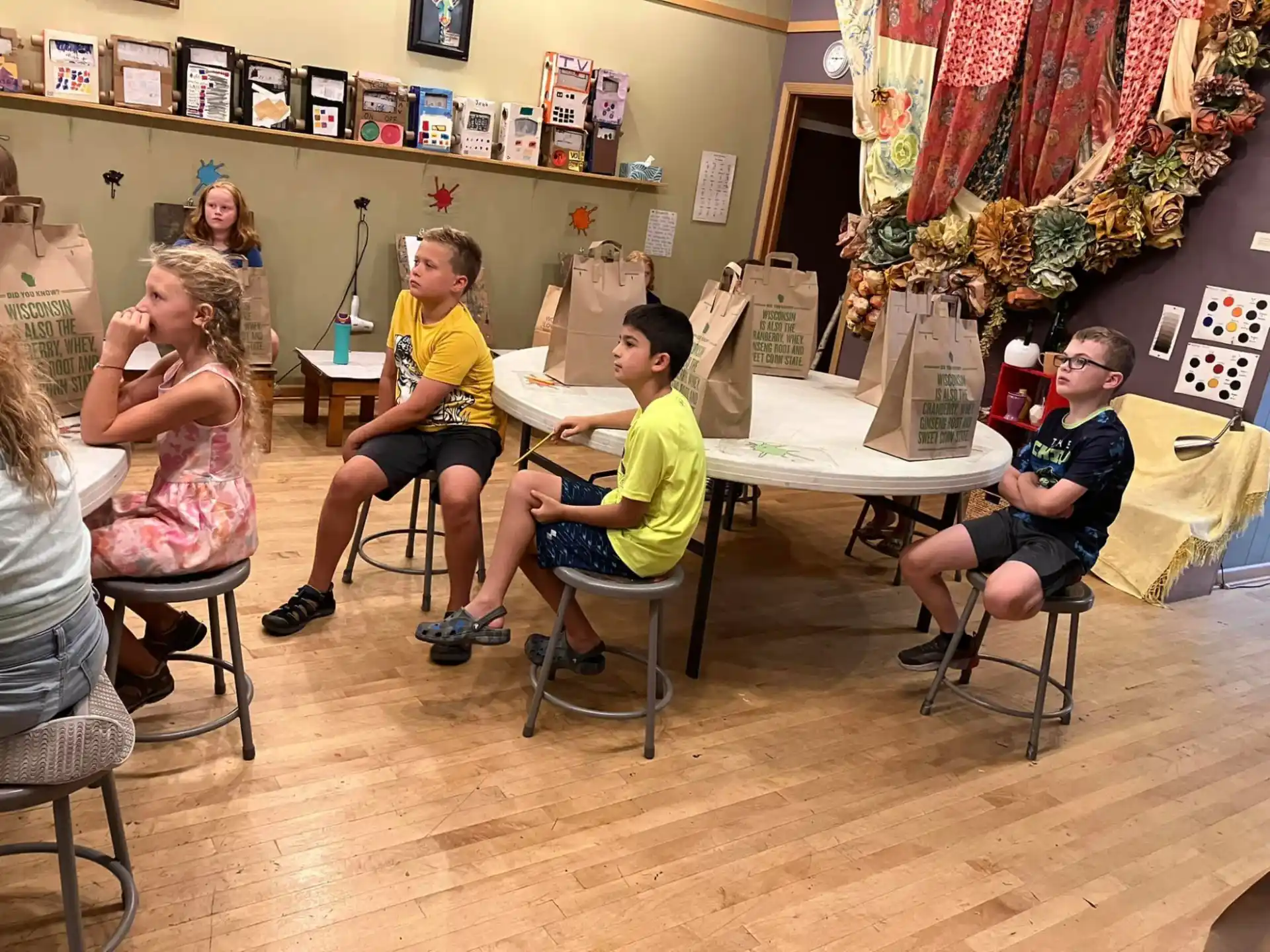 a group of people sitting at a table