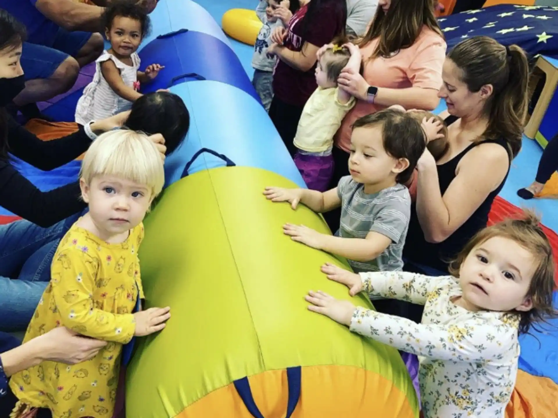 a group of children on a slide