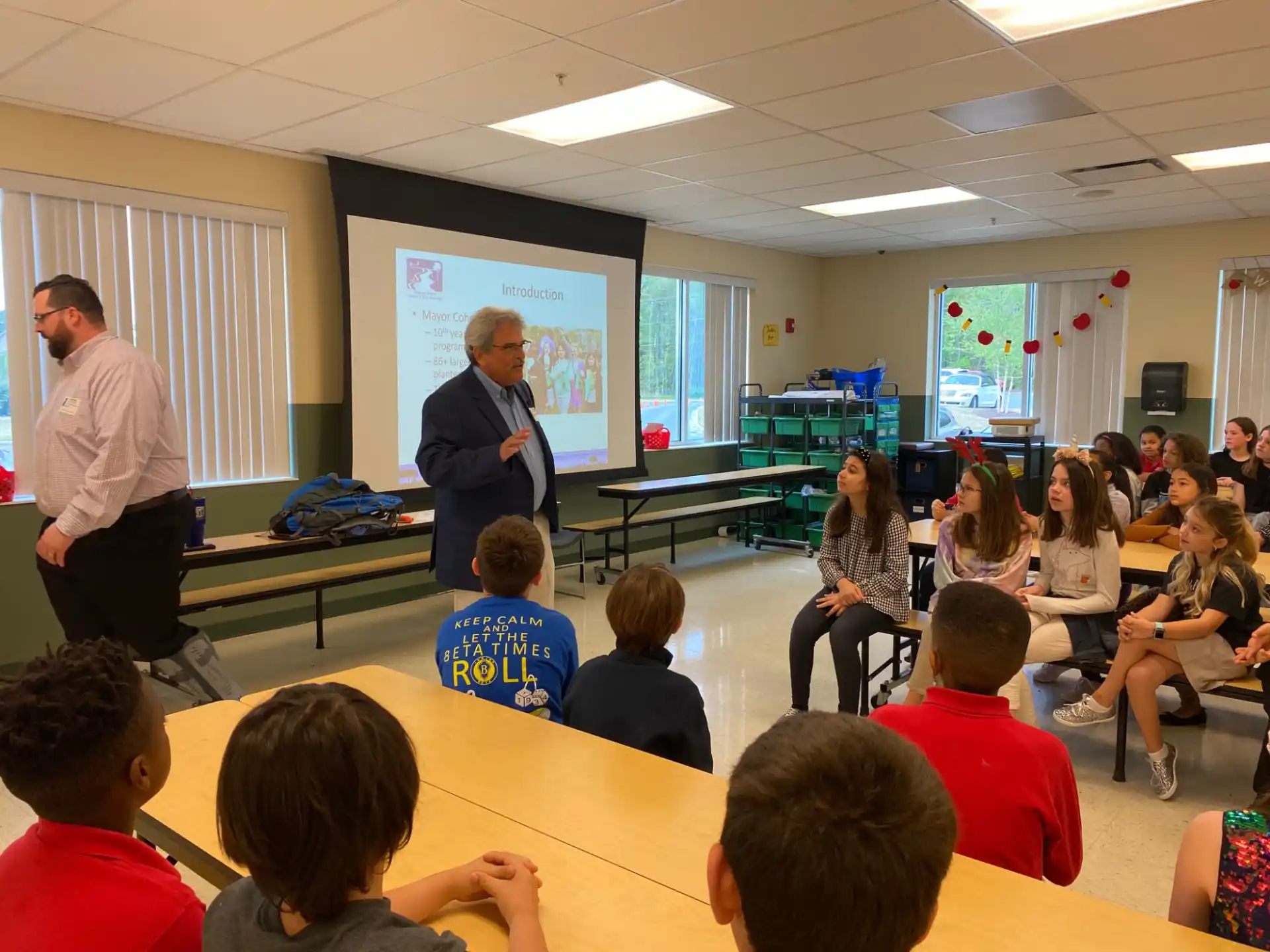 a person giving a presentation to a group of people