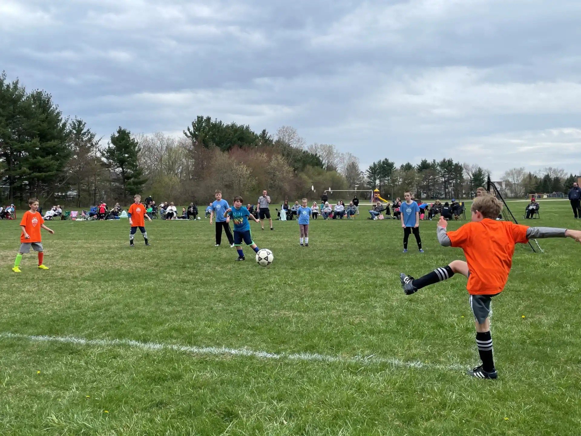 a group of people play football