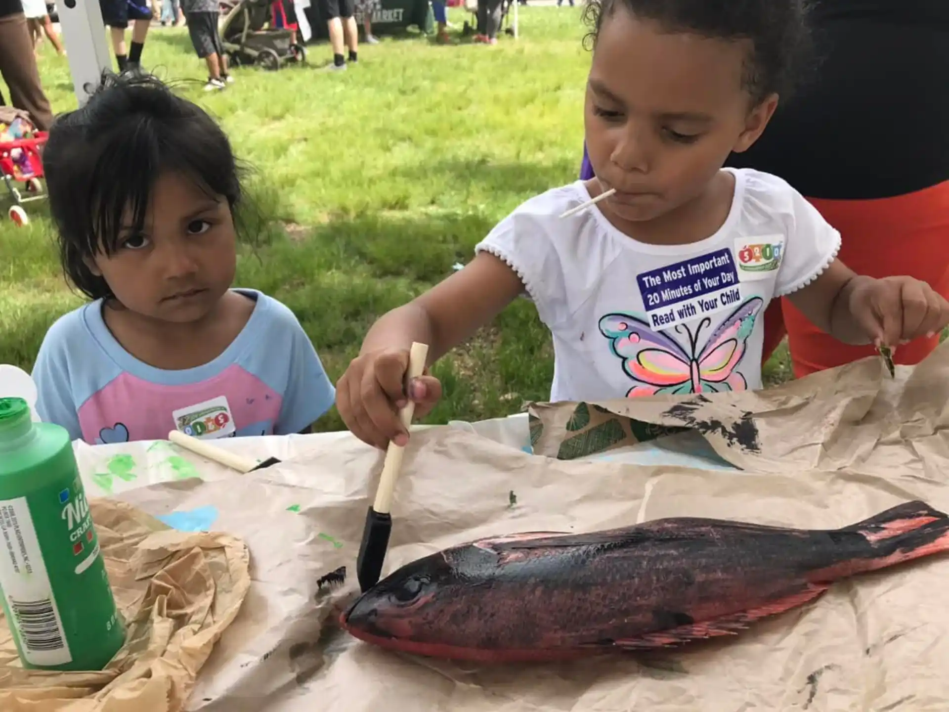 a couple of young girls painting