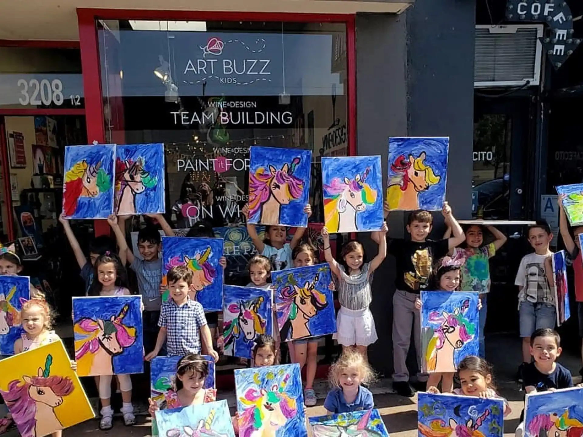 a group of children are performing in a street