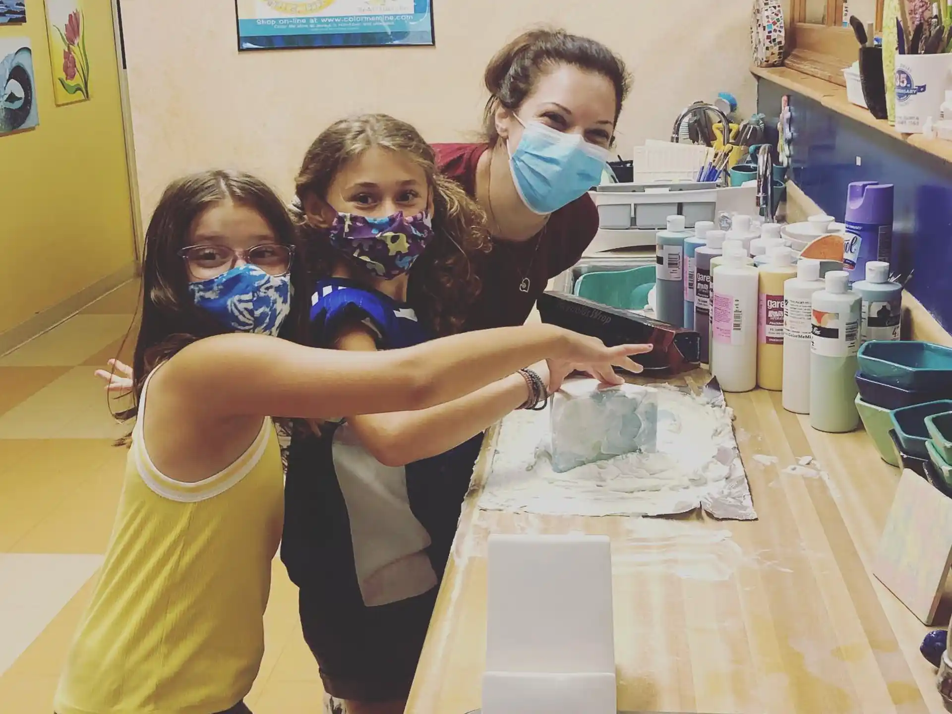 a group of people wearing masks