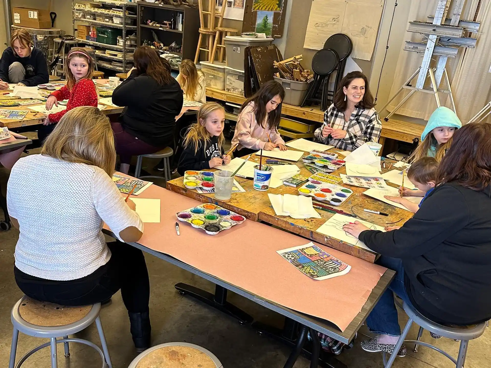 a group of people sitting around a table