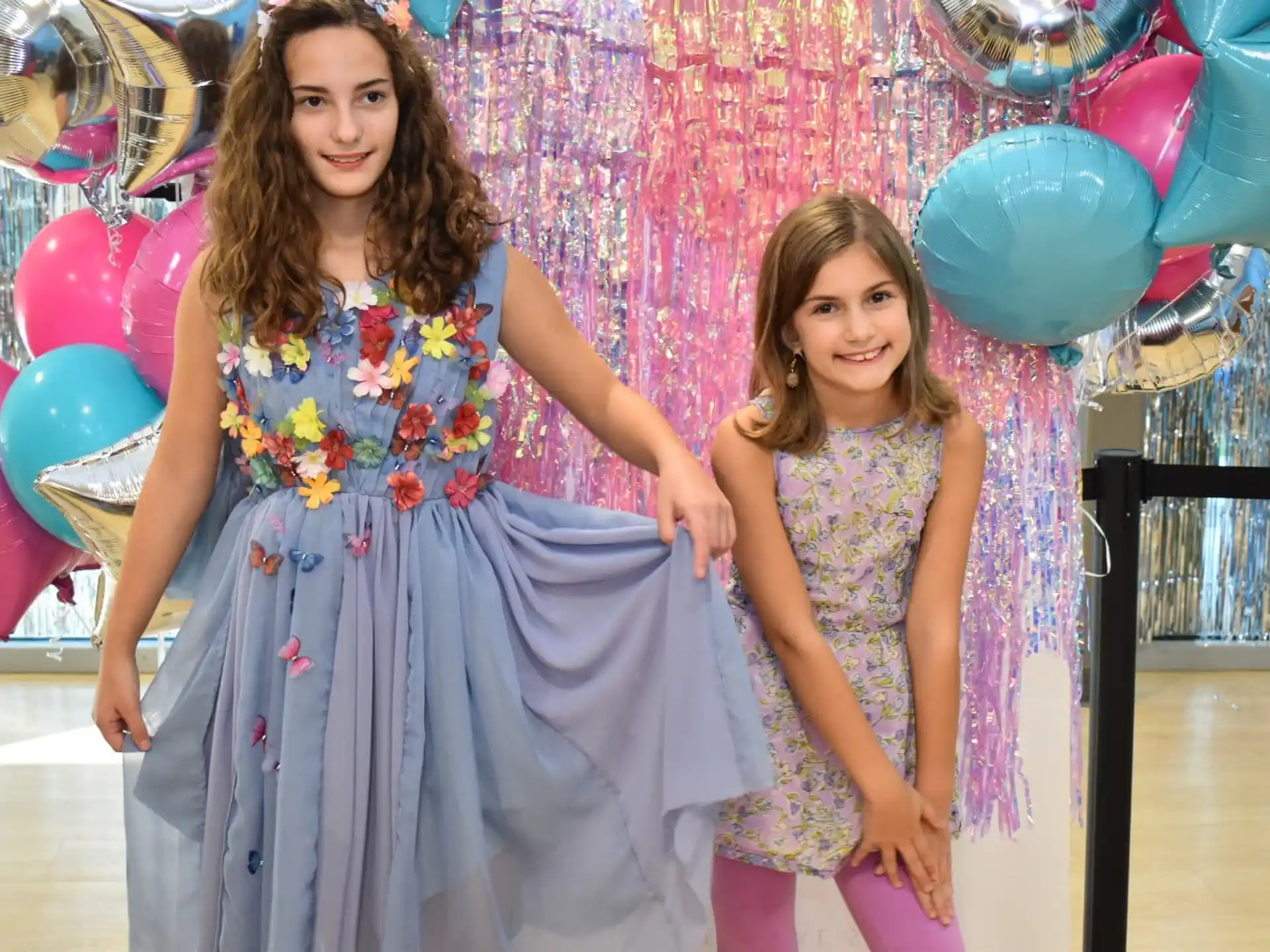 a person and a girl posing for a picture