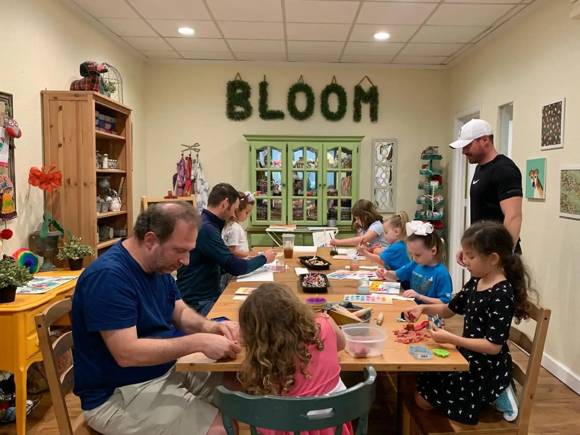 a group of people sitting around a table