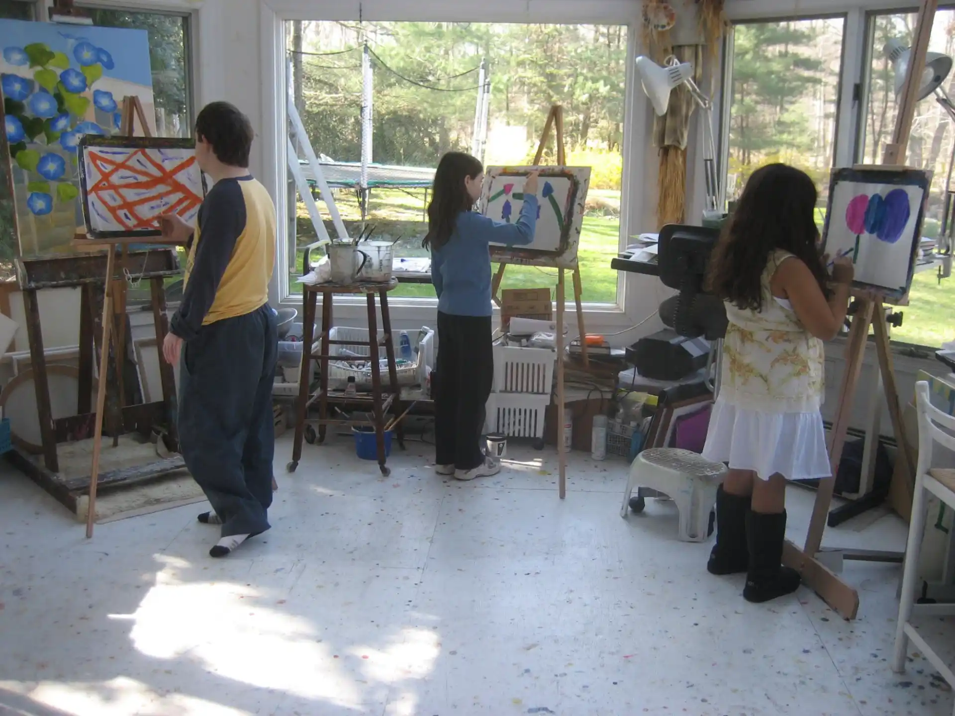 a group of people painting