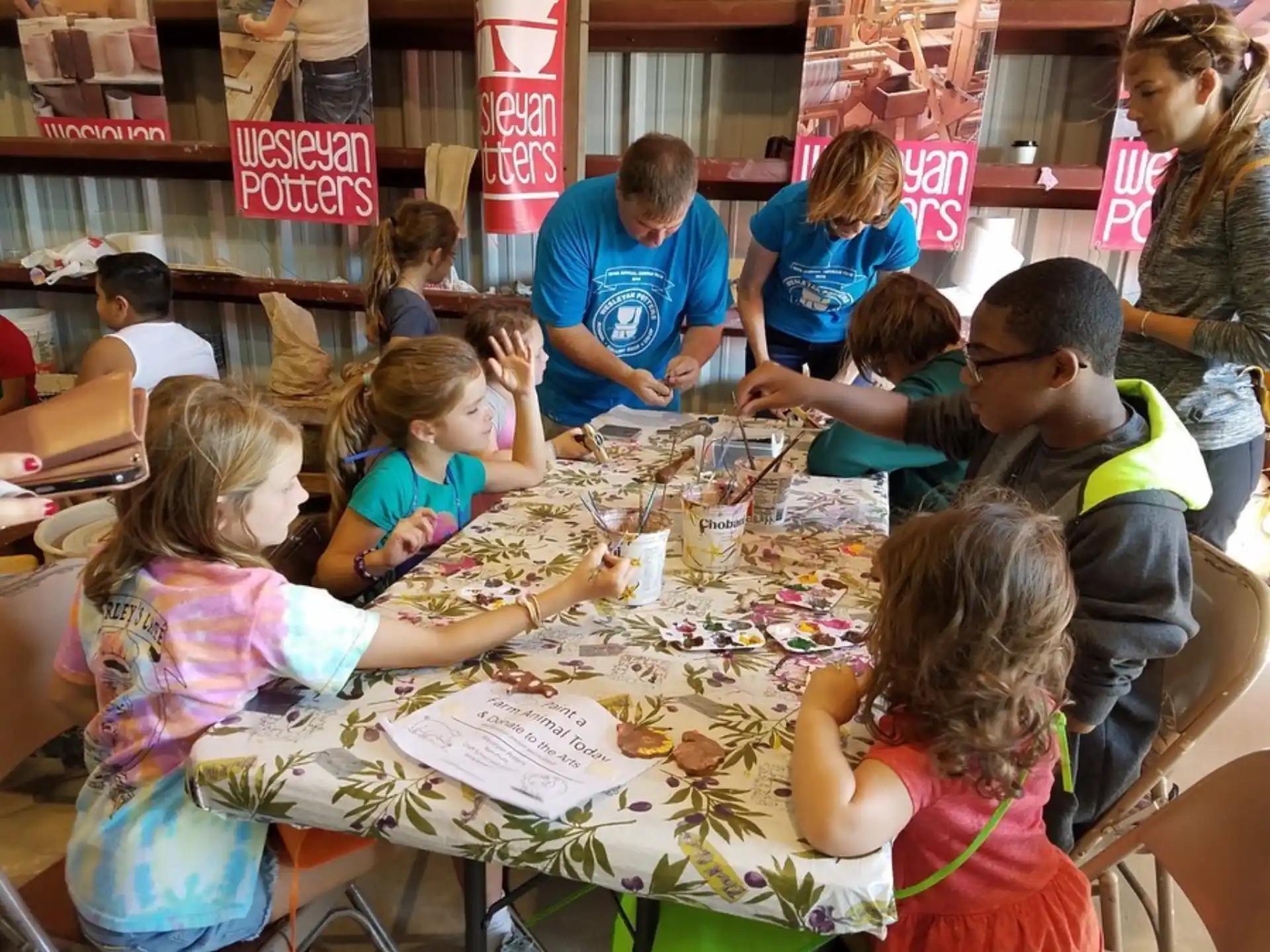 a group of people sitting around a table