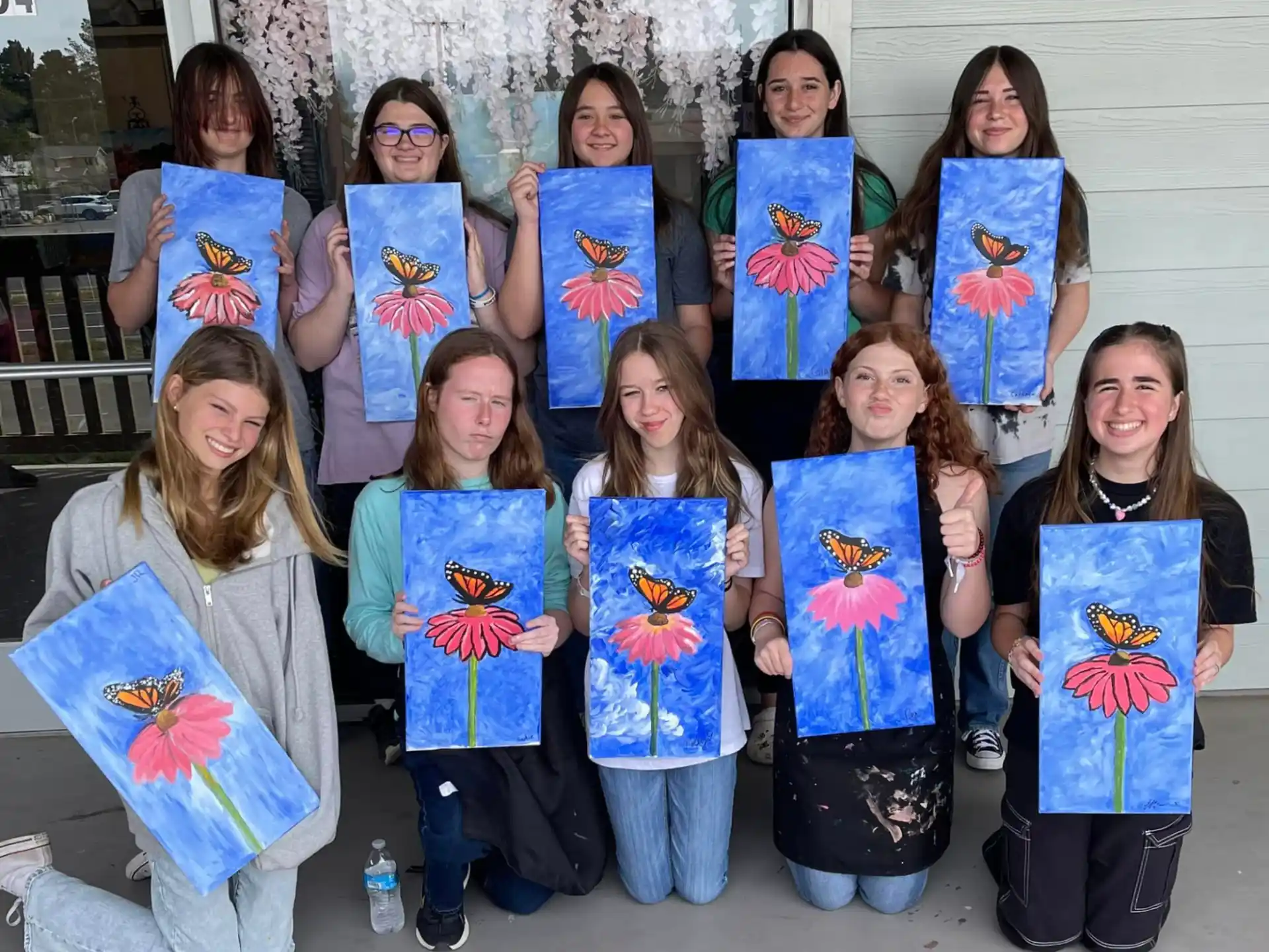 a group of girls wearing matching t-shirts