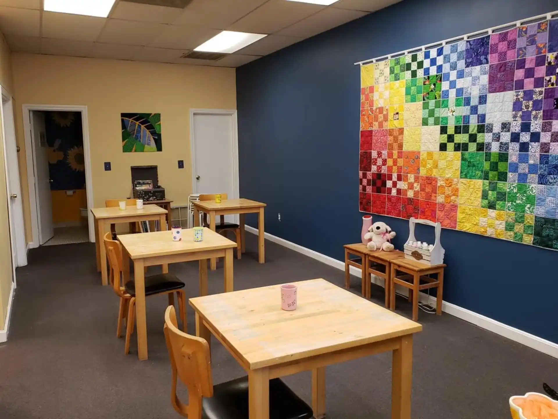 a room with tables and chairs