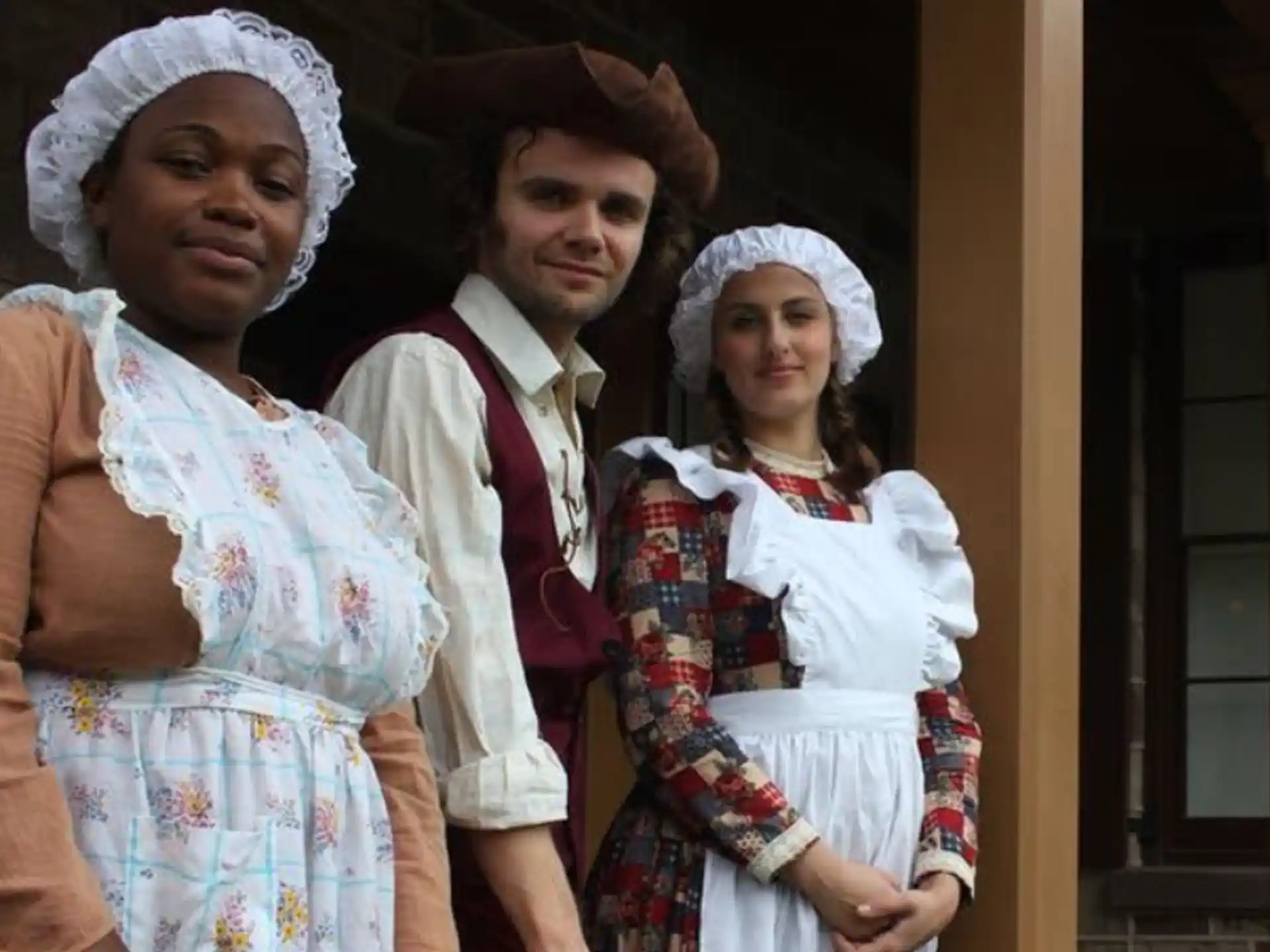 a group of people posing for the camera