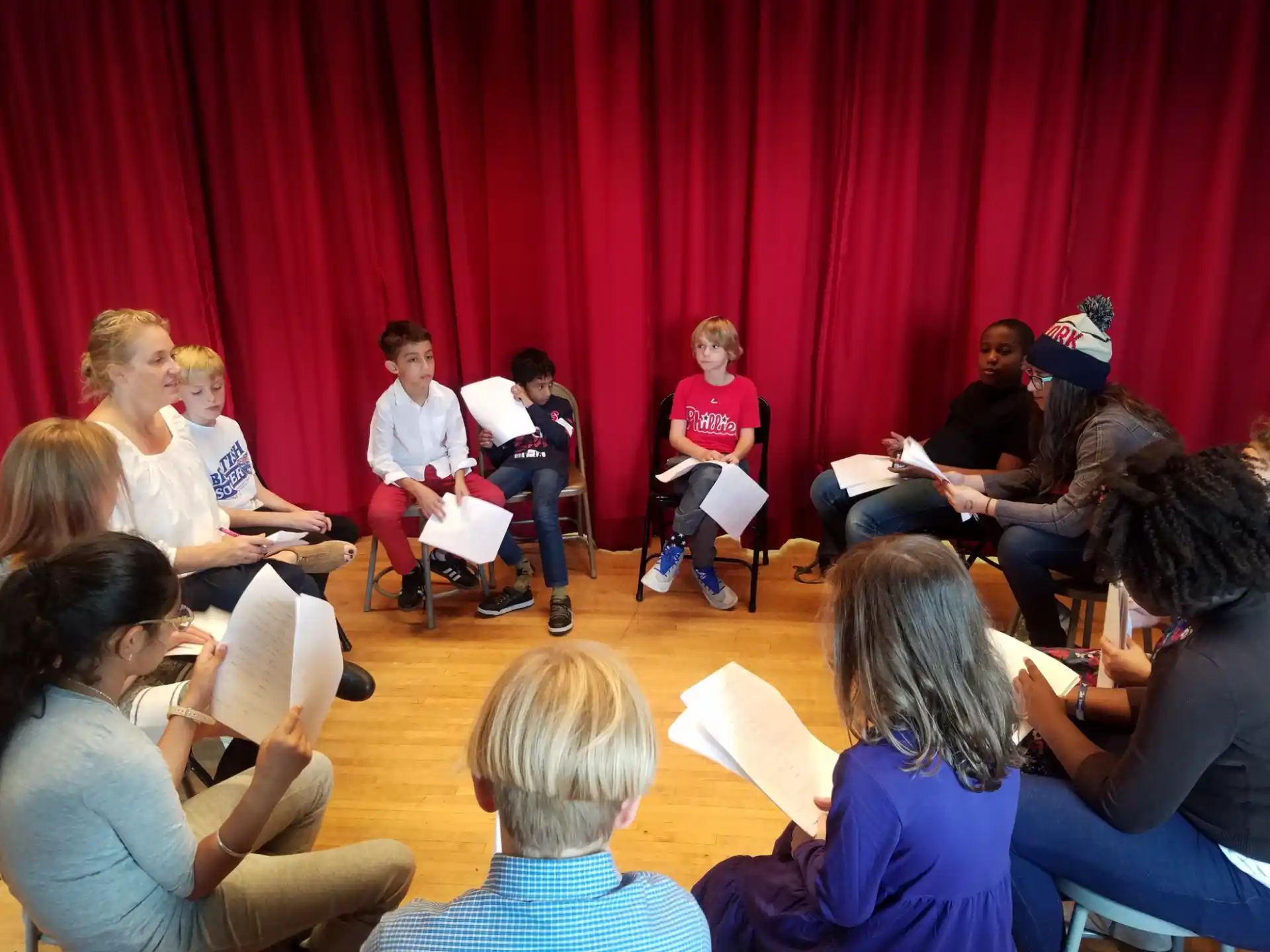 a group of people sitting in chairs