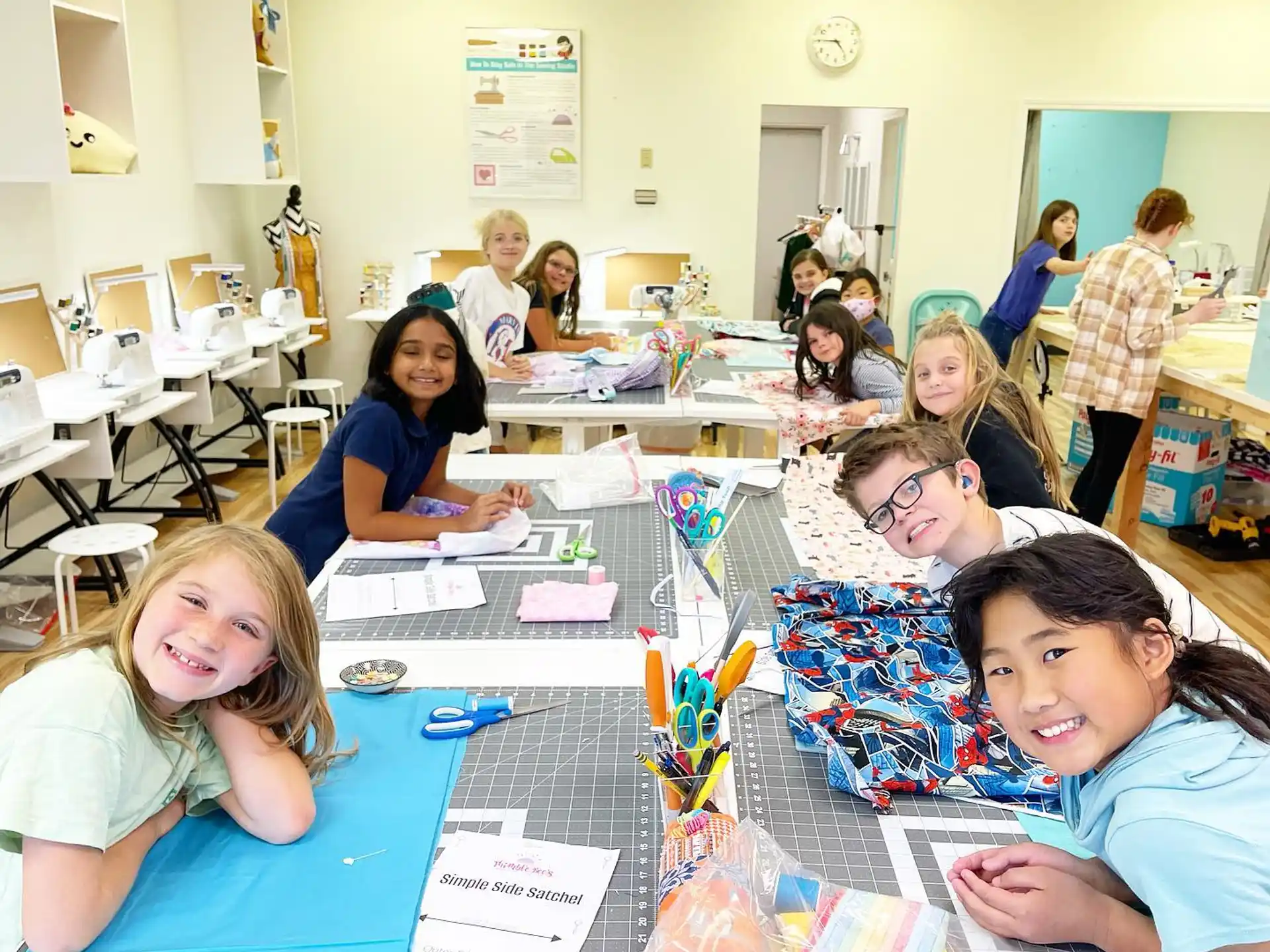 a group of children sitting at tables