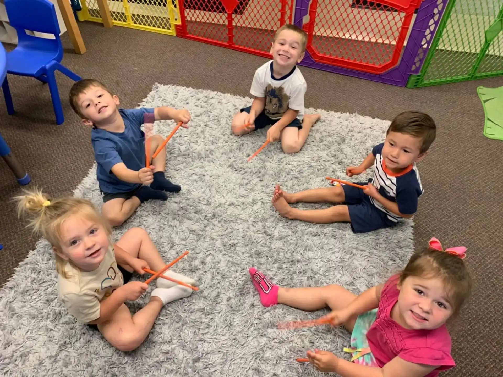 a group of children playing on the ground