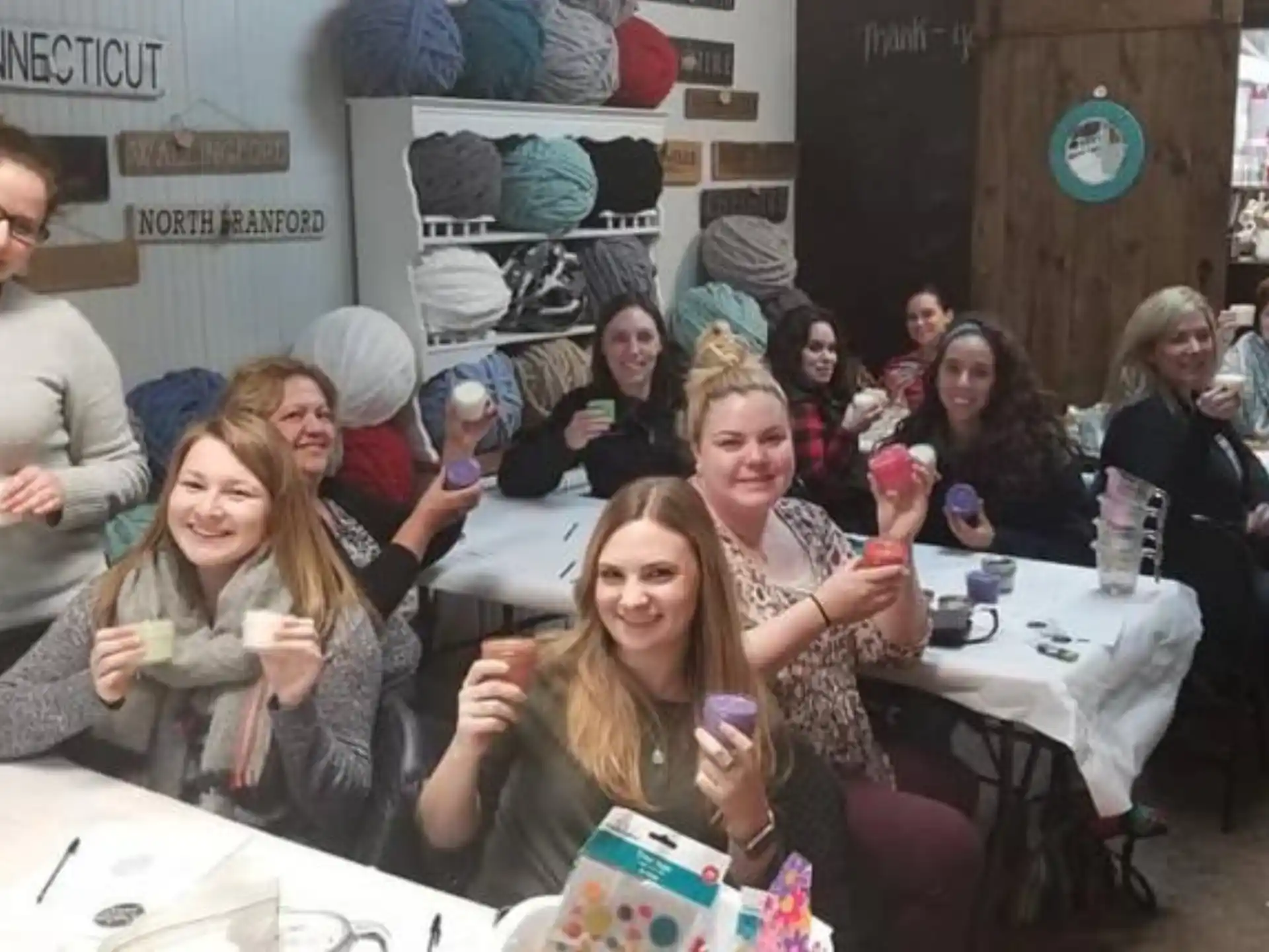 a group of people sitting at tables