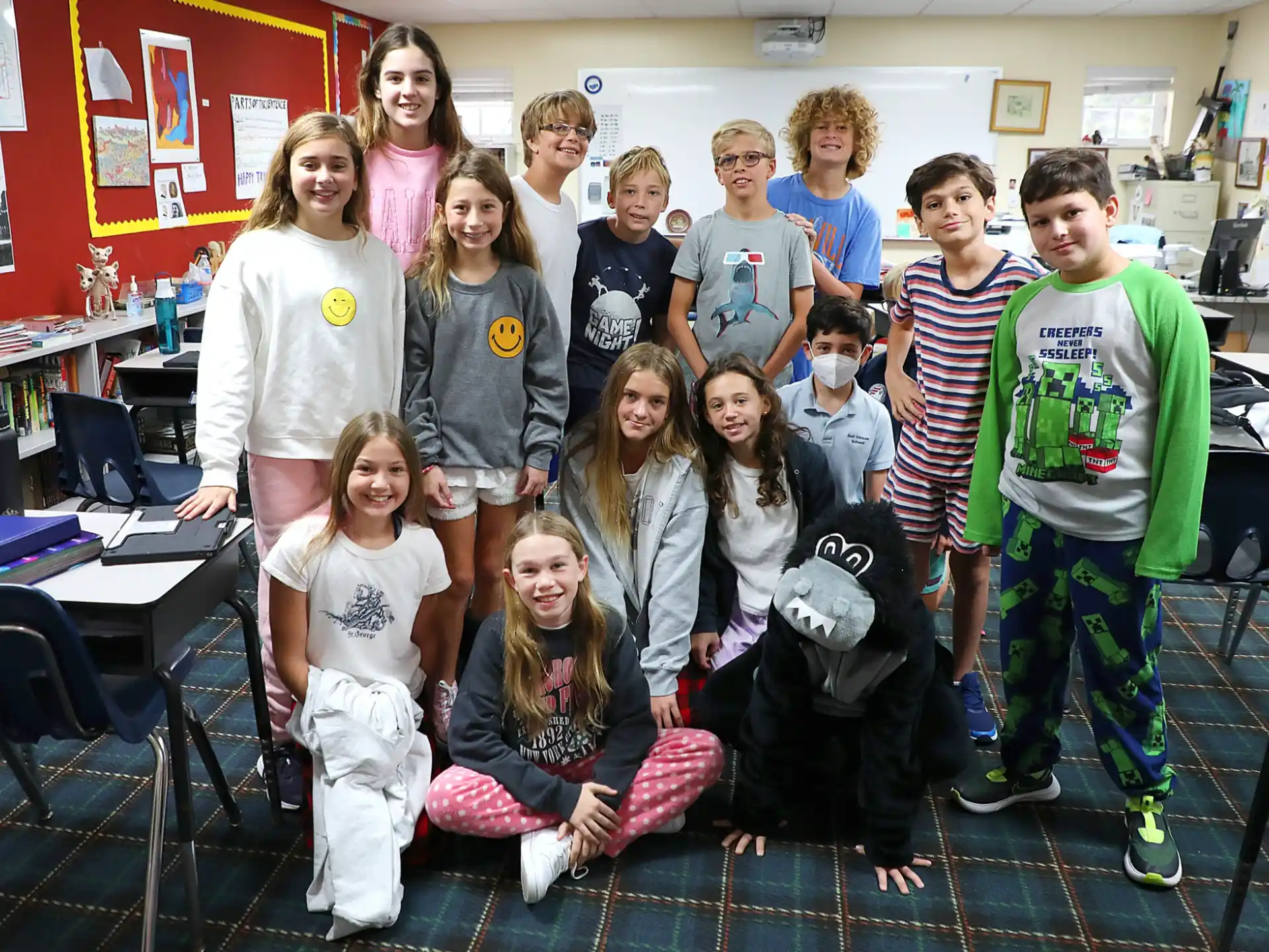 a group of children posing for a photo